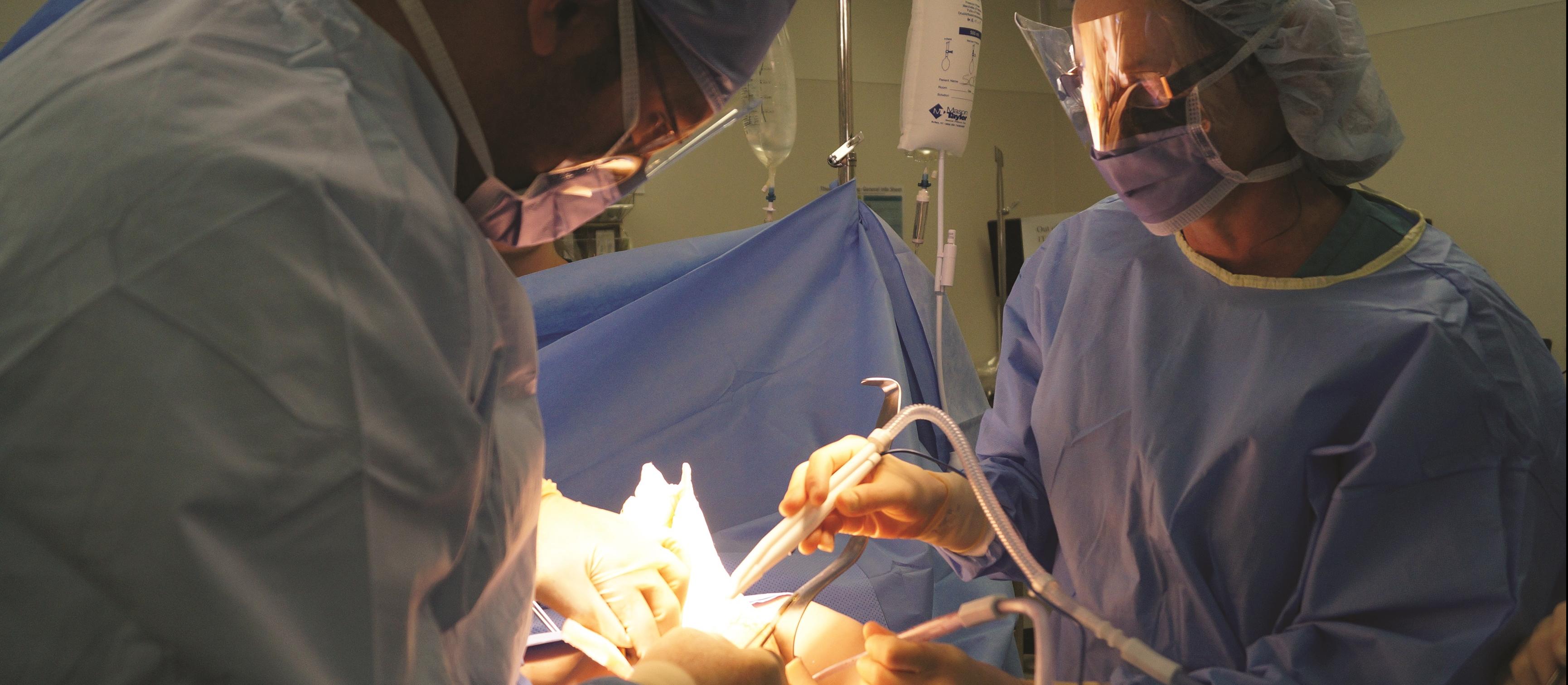Surgeons operating