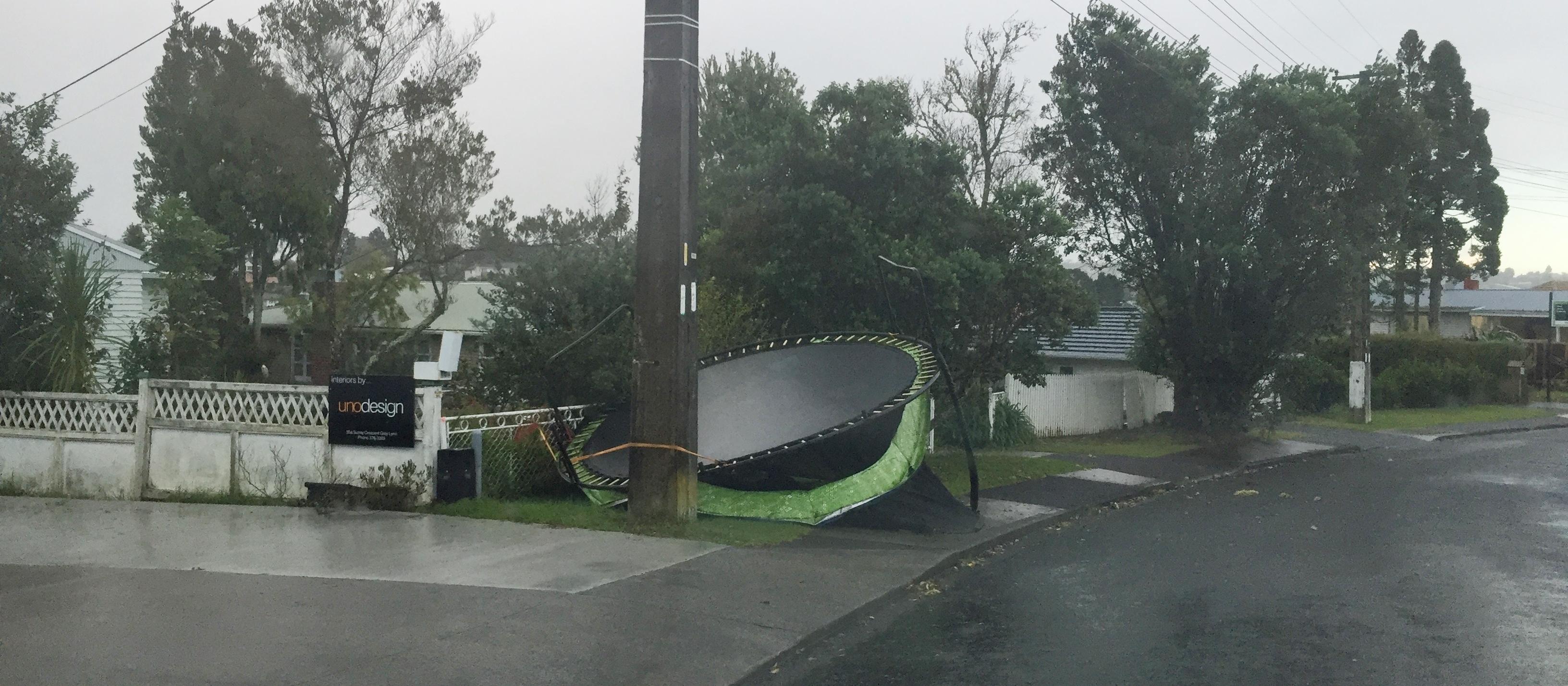 Trampoline blown about by storm