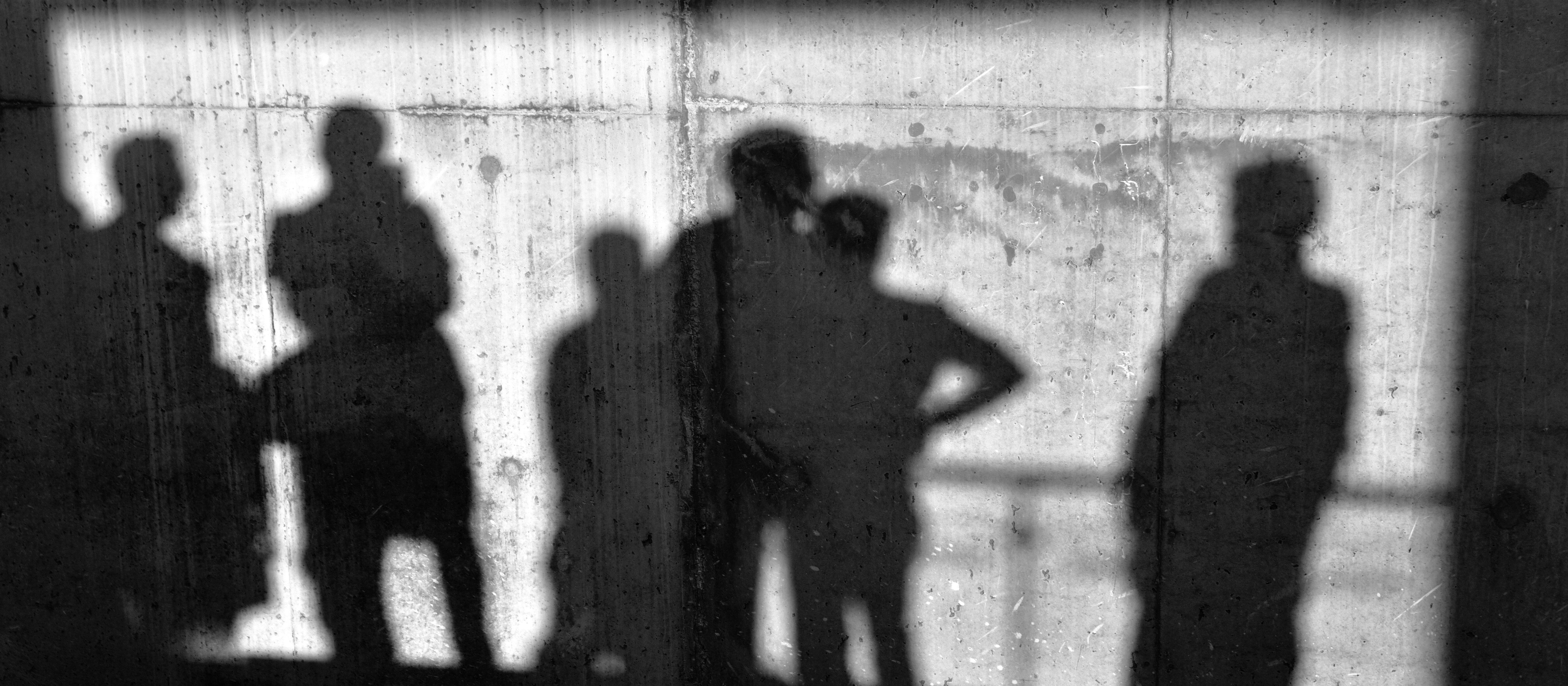 Shadows, people, wall