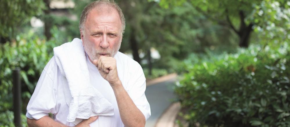 man coughing