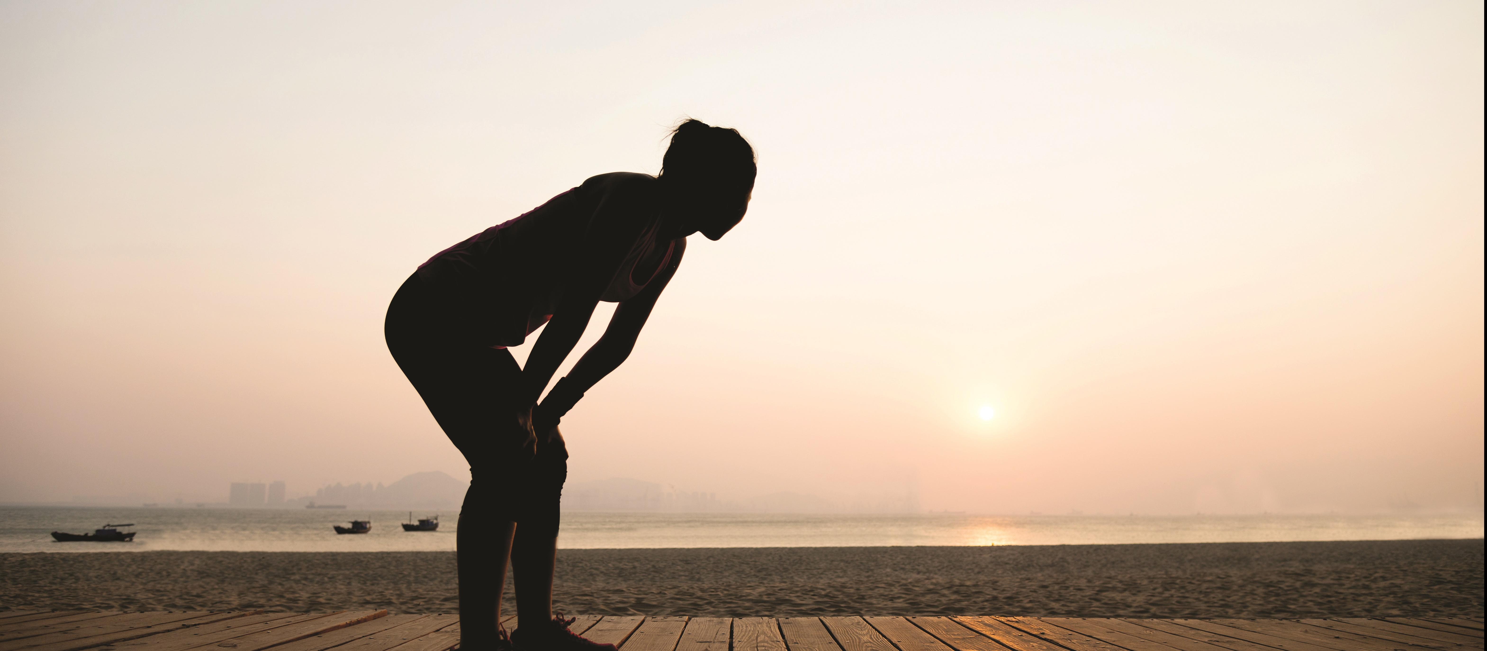 Woman runner rests