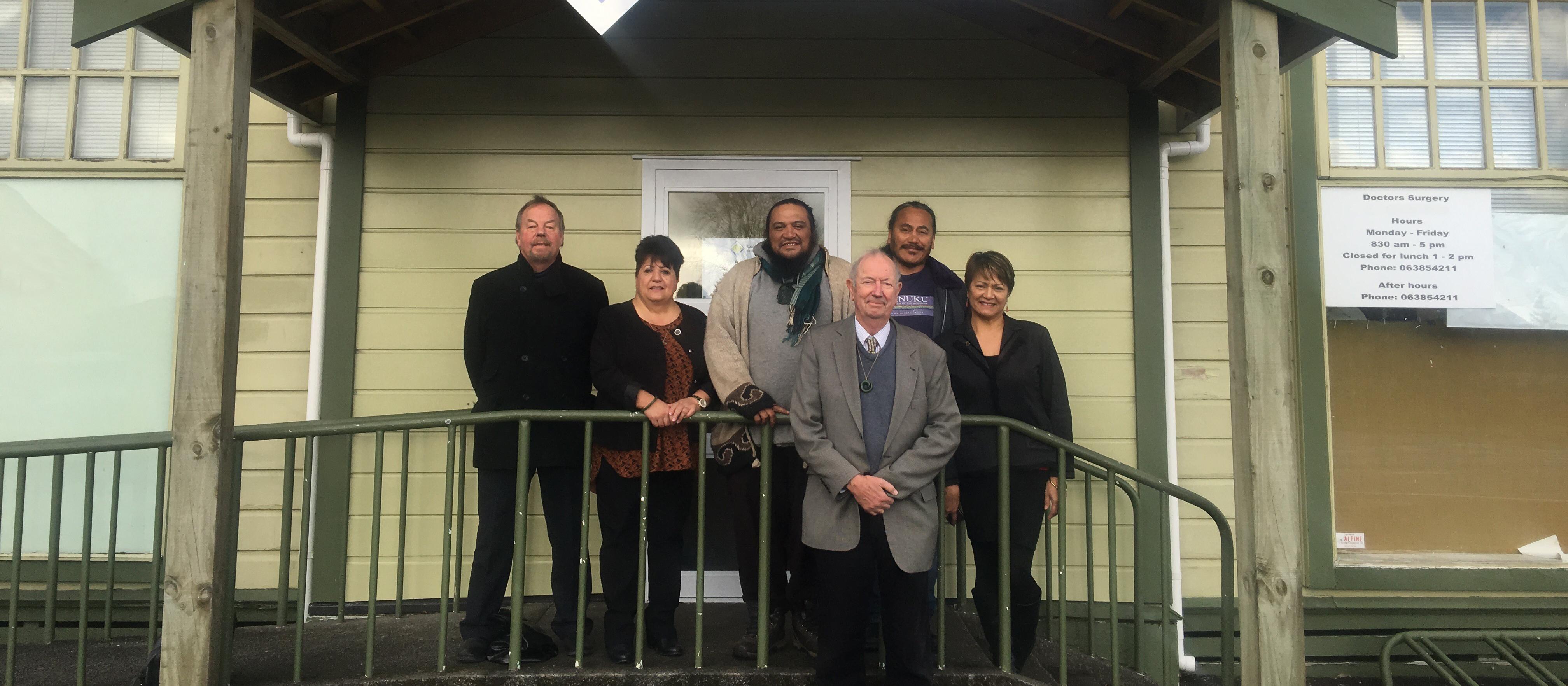 At the opening of Ruapehu Health in Raetihi on 2 July 2018 were Ruapehu district councillor Ben Goddard, Honey Winter of Uenuku Charitable Trust, mana whenua Fred Clarke, Whanganui Regional Health Network director Michael Sewell, Uenuku Charitable Trust chairperson Aiden Gilbert, and Soraya Peke-Mason of Ngāti Rangi Trust