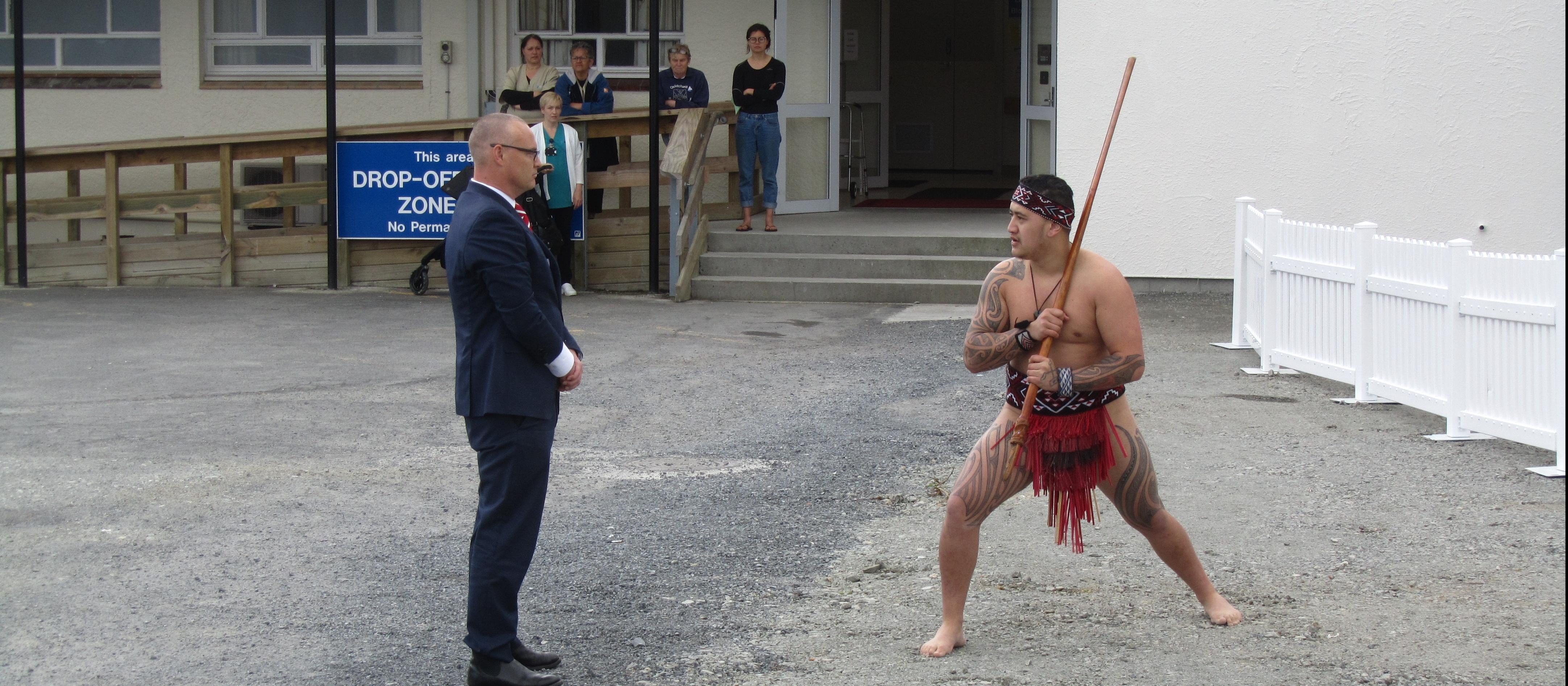Health minister David Clark accepts the wero (challenge) during the pōwhiri at Bay of Islands Hospital 