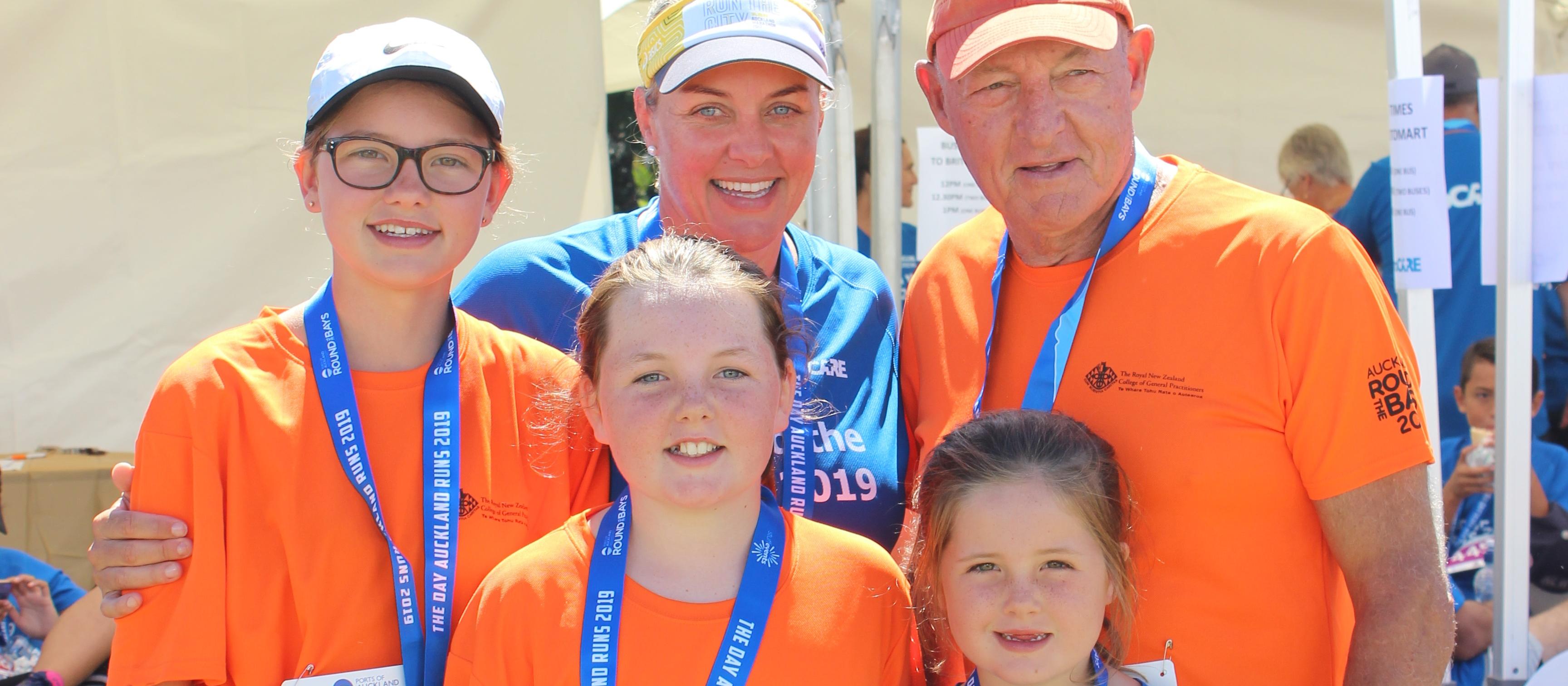 Stephanie Taylor of St Heliers Bay Medical Centre with her three daughters and her father