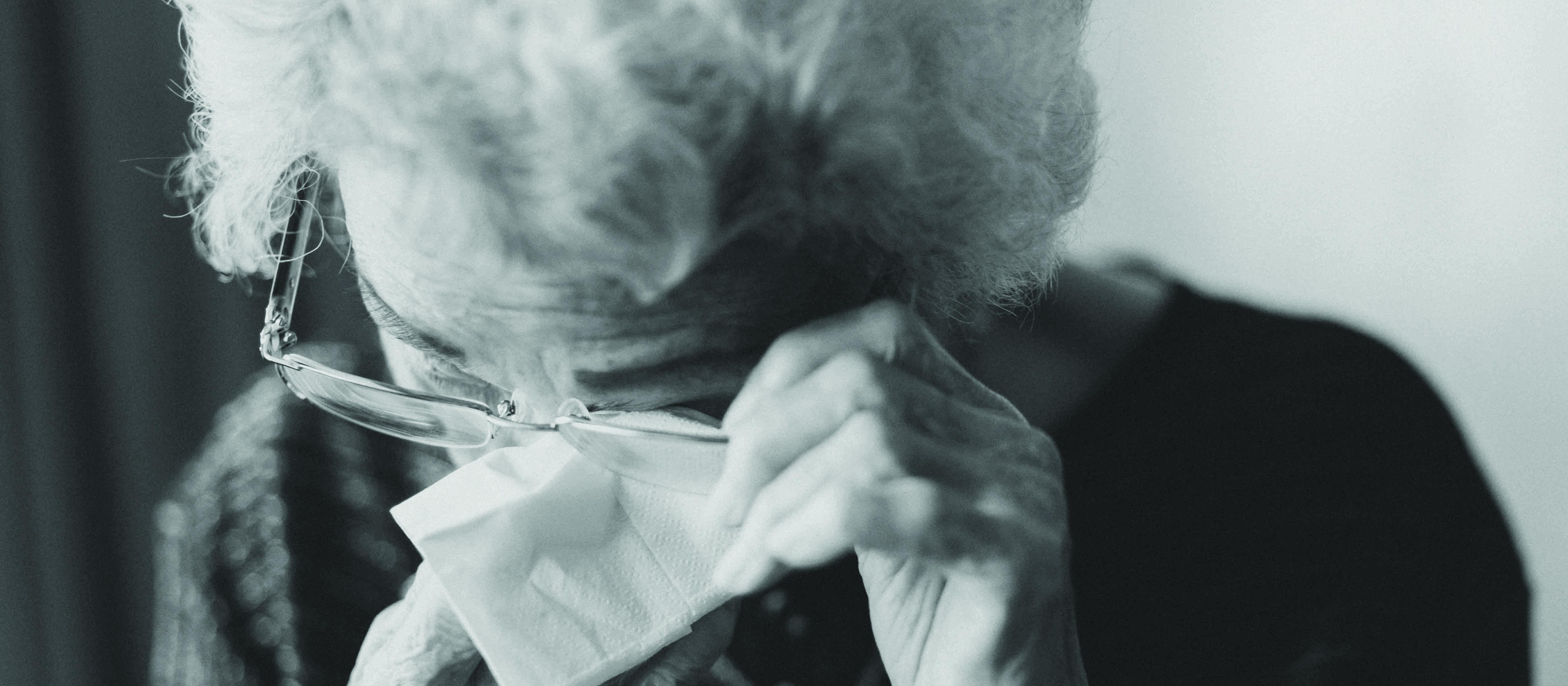 Sad elderly woman