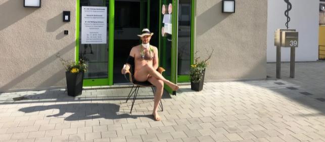 german gps strip to protest for more ppe covid-19