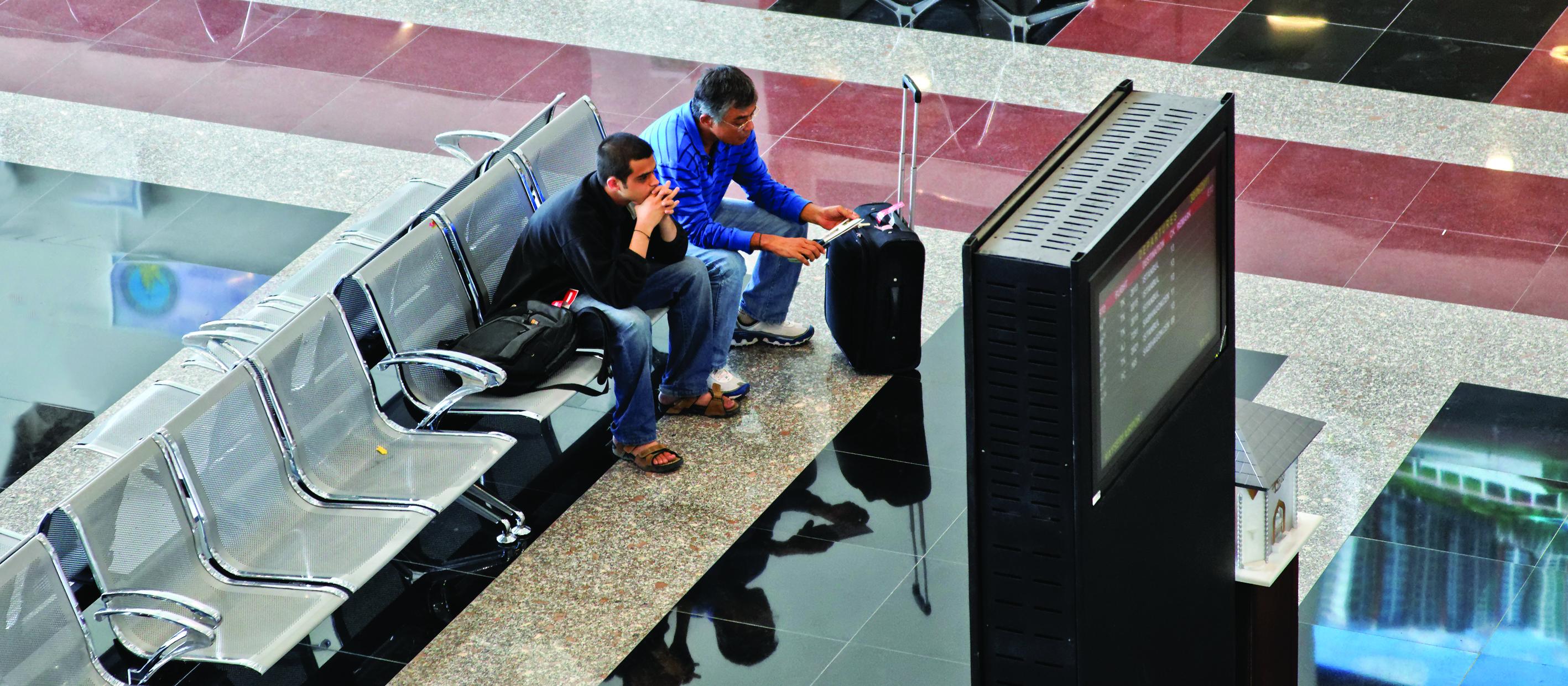 Men waiting at the airport