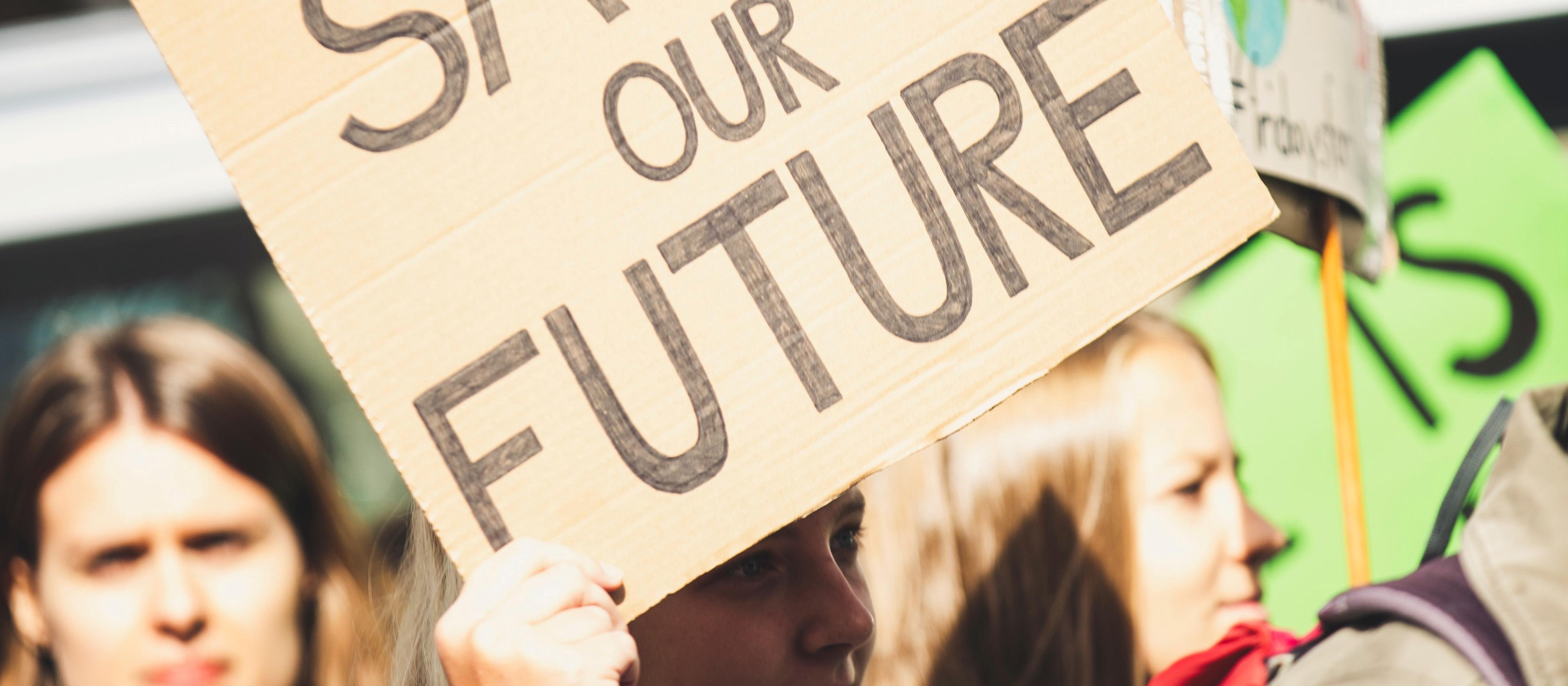 Save Our Future sign - credit Markus Spiske / Unsplash