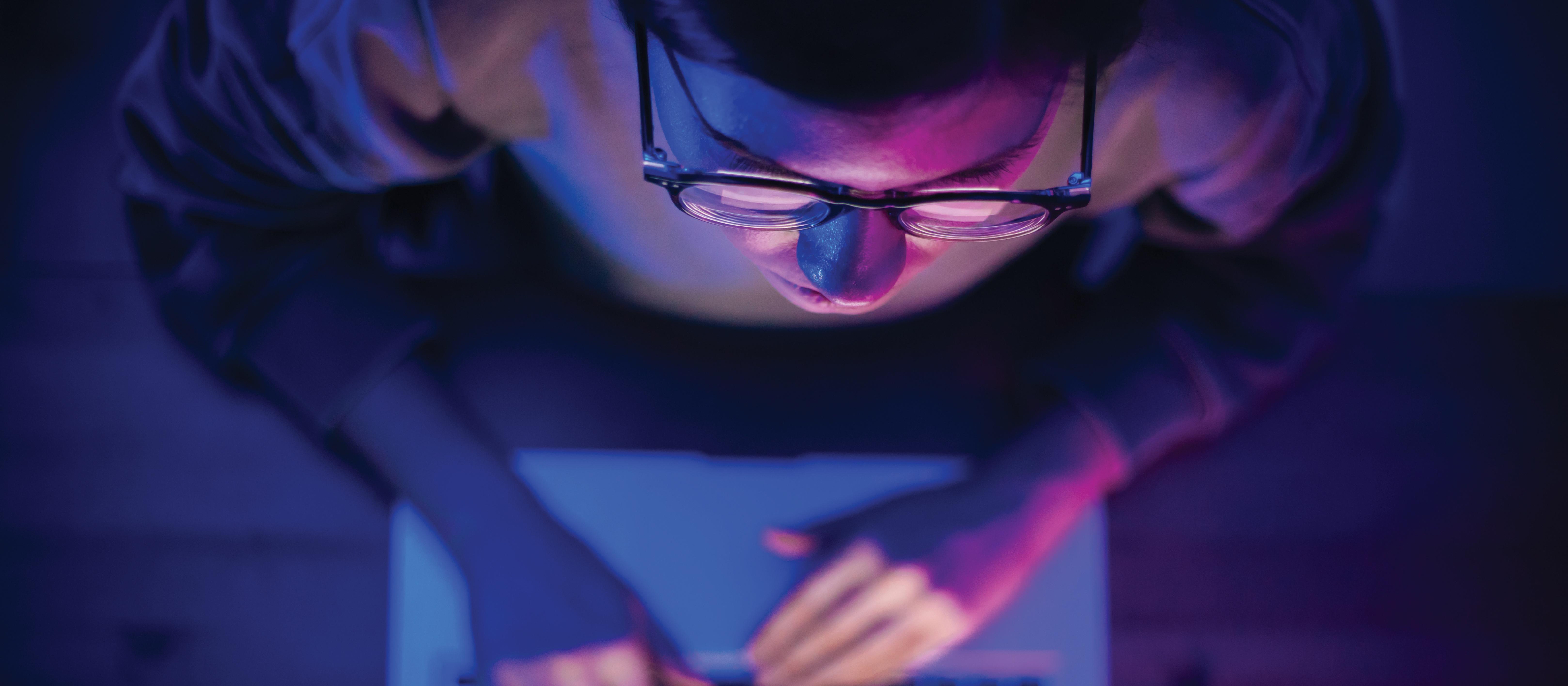 Guy at a computer screen_iStock