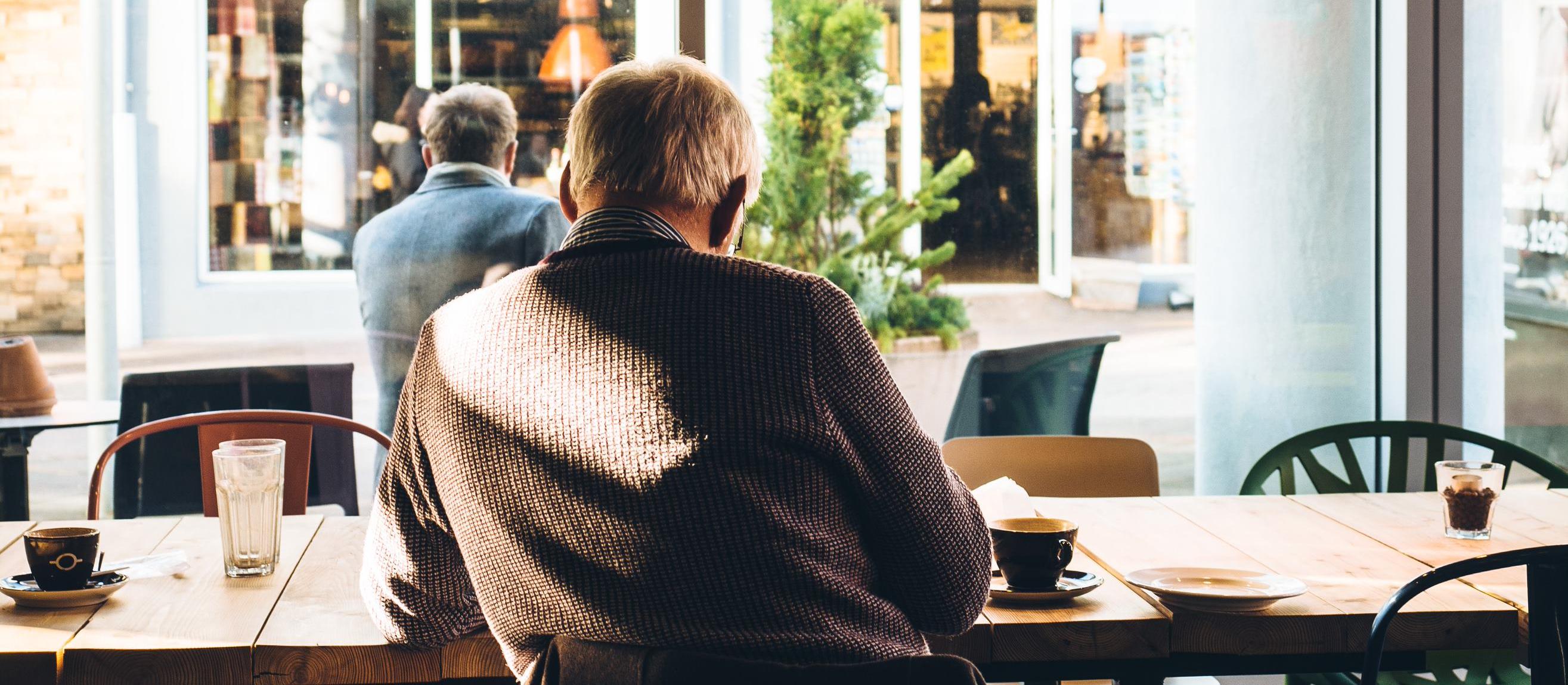 Retired GP in a cafe