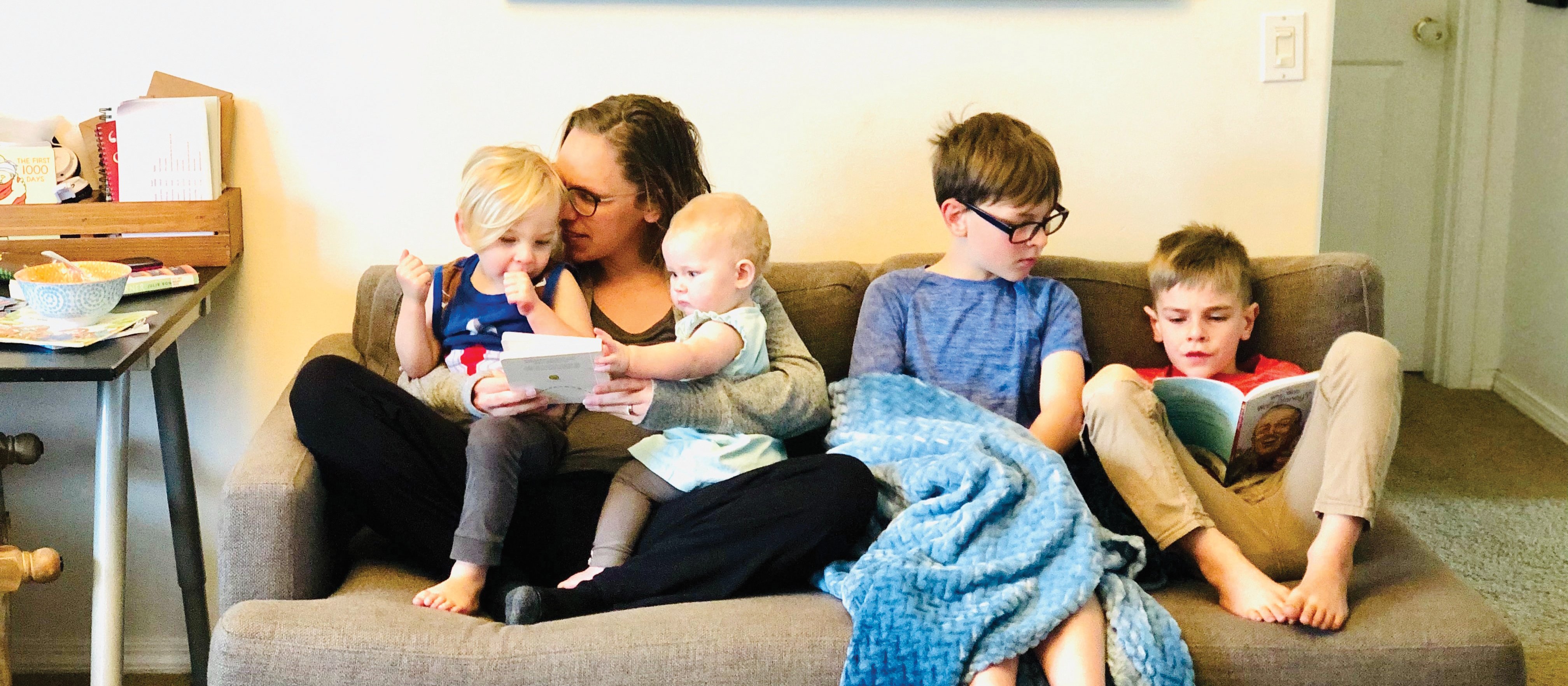 Family on couch_CR_Brooks Rice on Unsplash