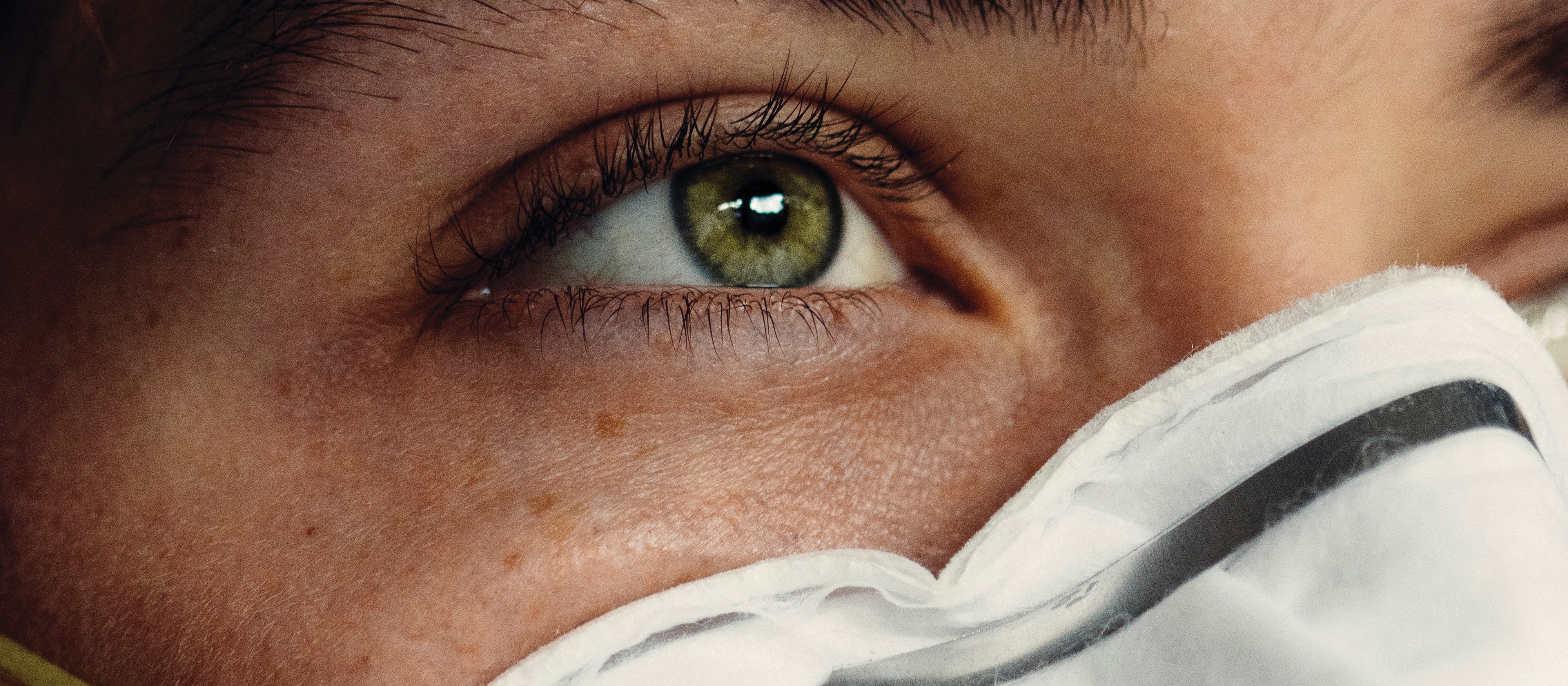 Person wearing a mask_Griffin Wooldridge on Unsplash