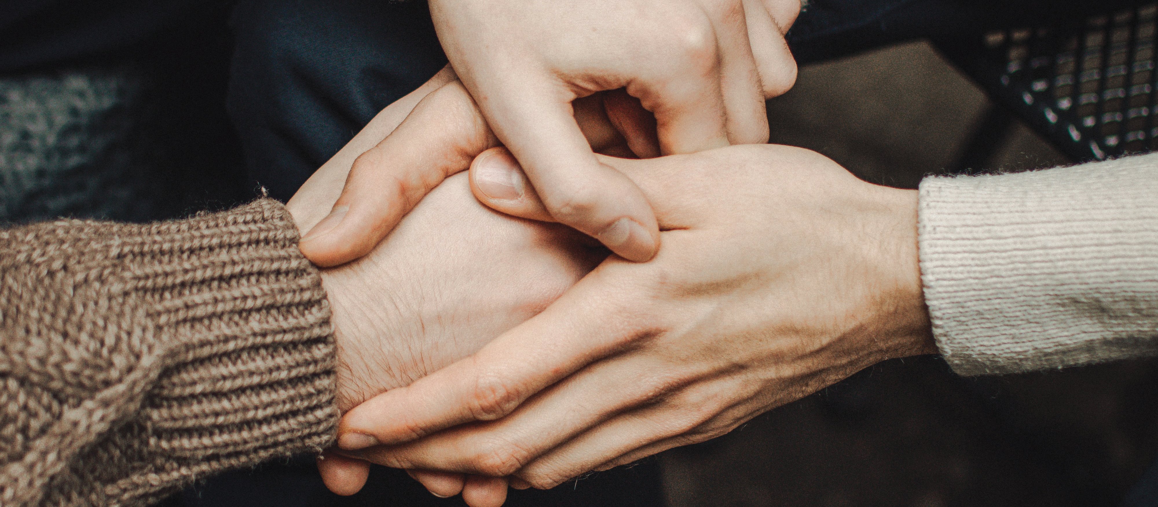 Supportive hand holding_Renate Vanaga on Unsplash