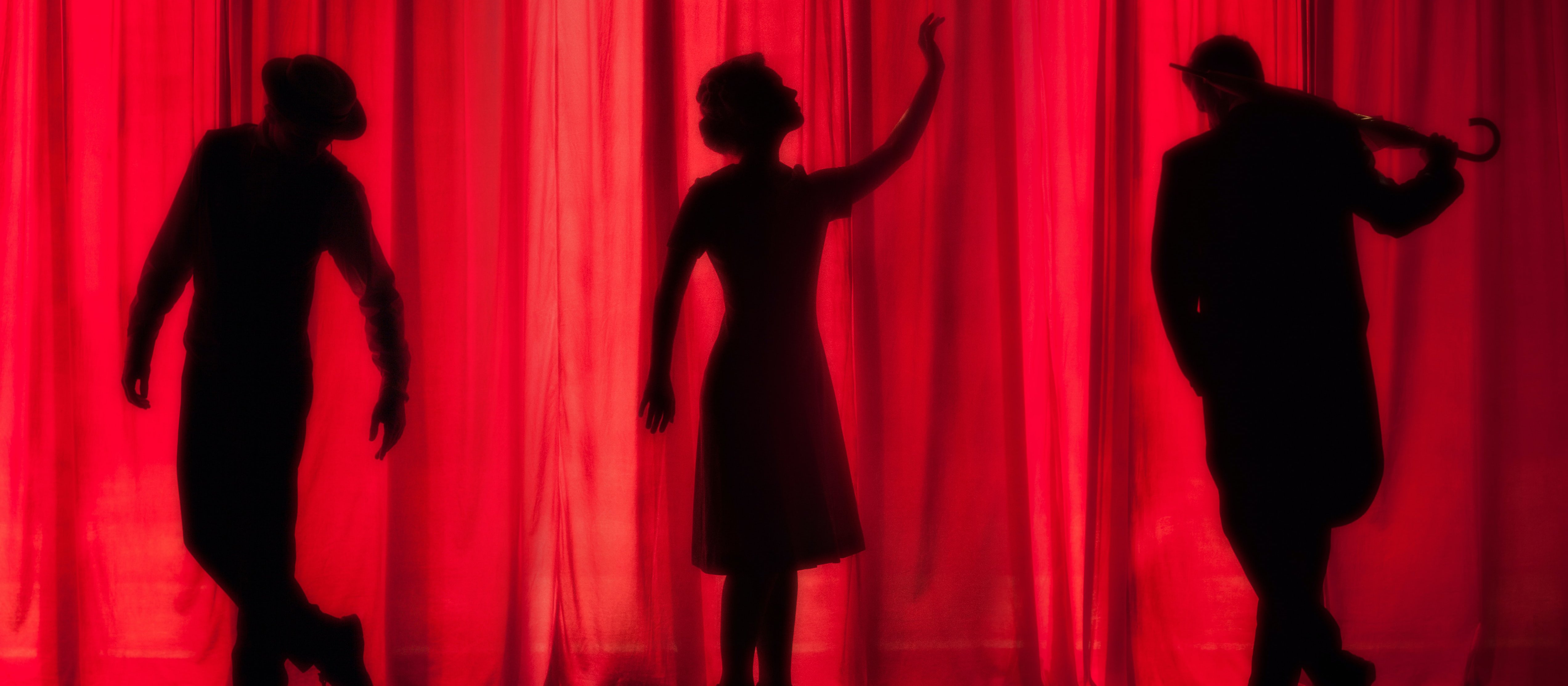1011 Silhouettes red curtain CR Kyle Head on Unsplash.jpeg