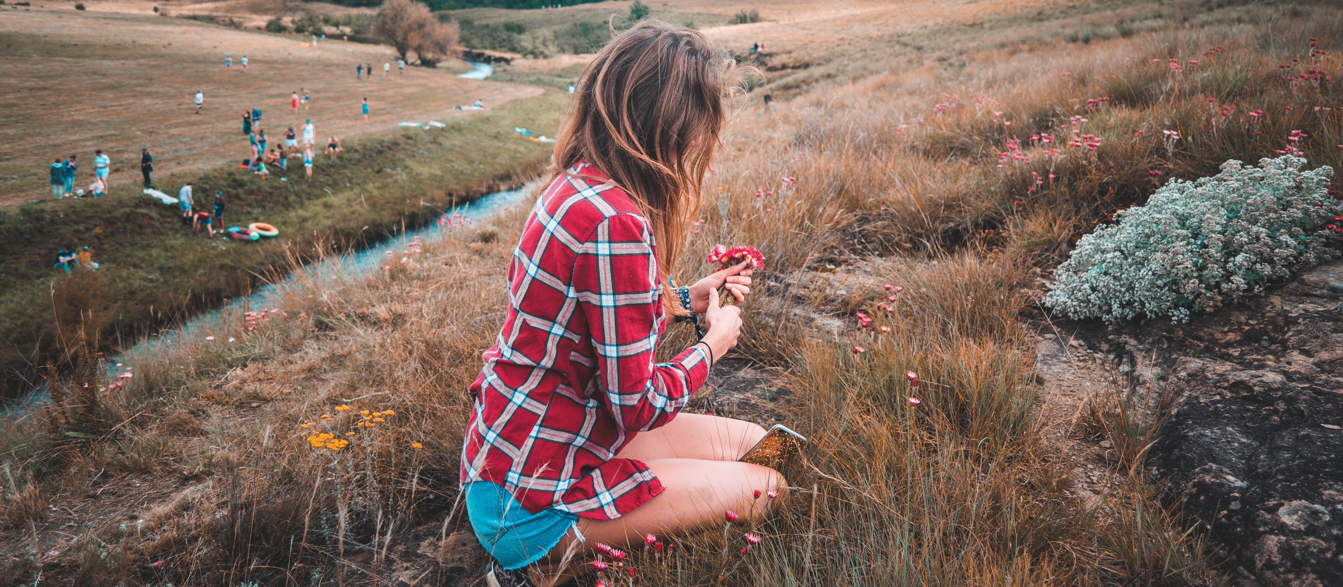 girl with flowers CR peter fogden on unsplash.jpeg