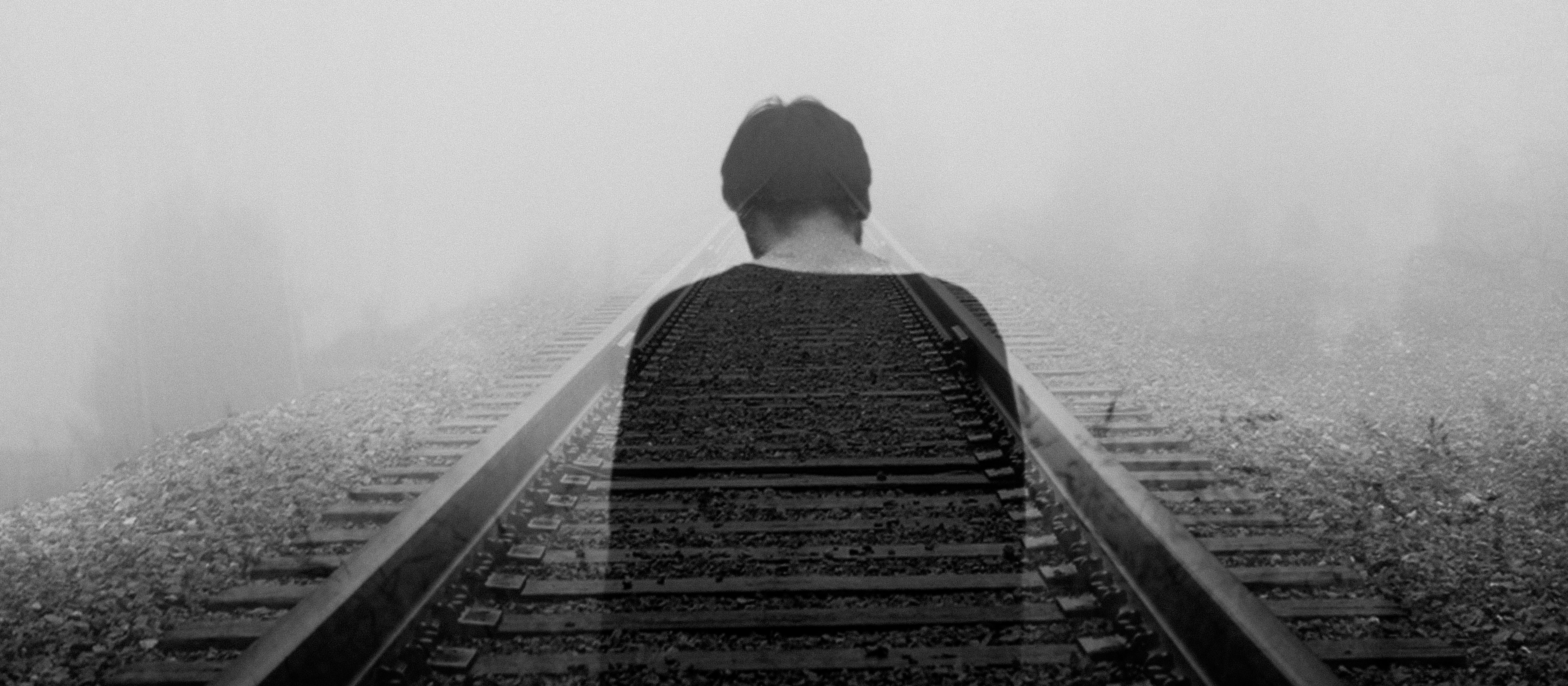 lost soul on rail track_Gabriel on Unsplash.jpeg