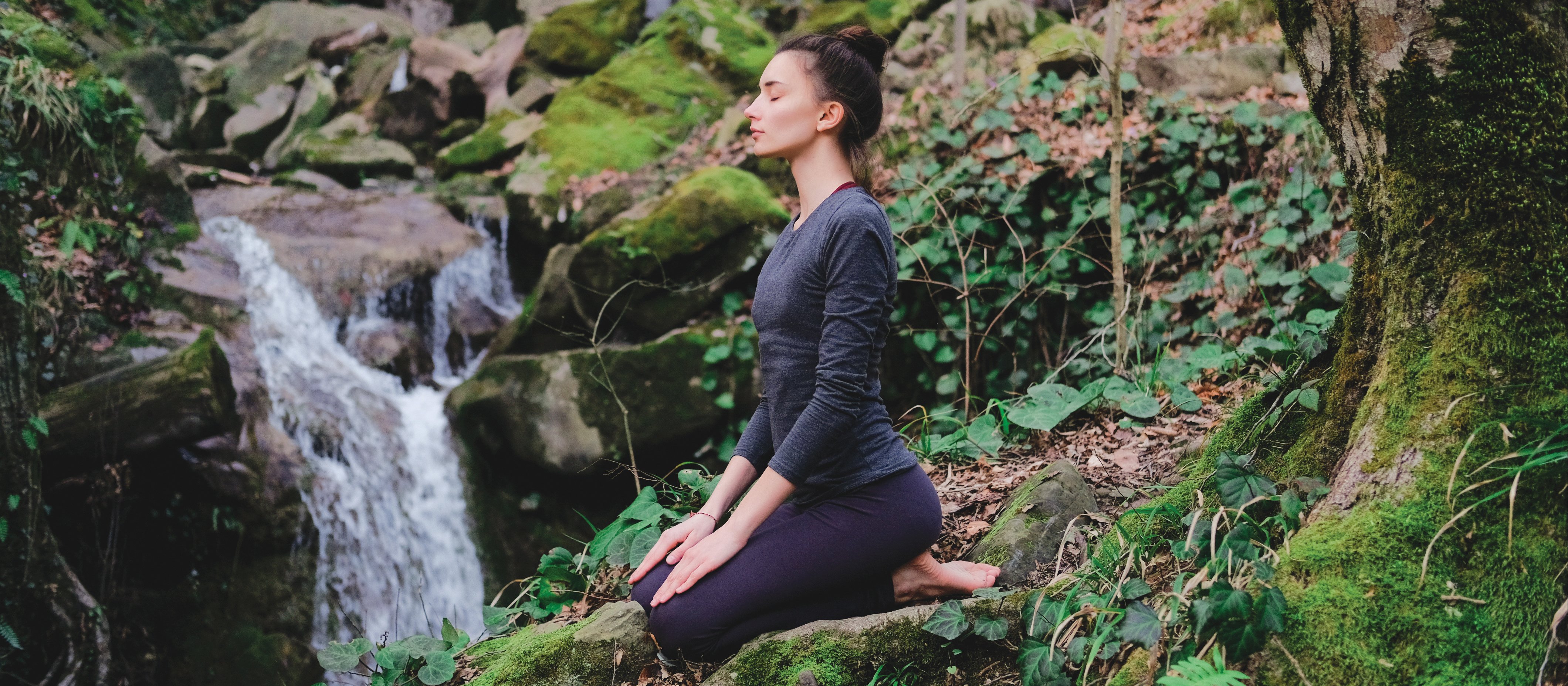 Woman Meditating forest CR Yolya on iStock