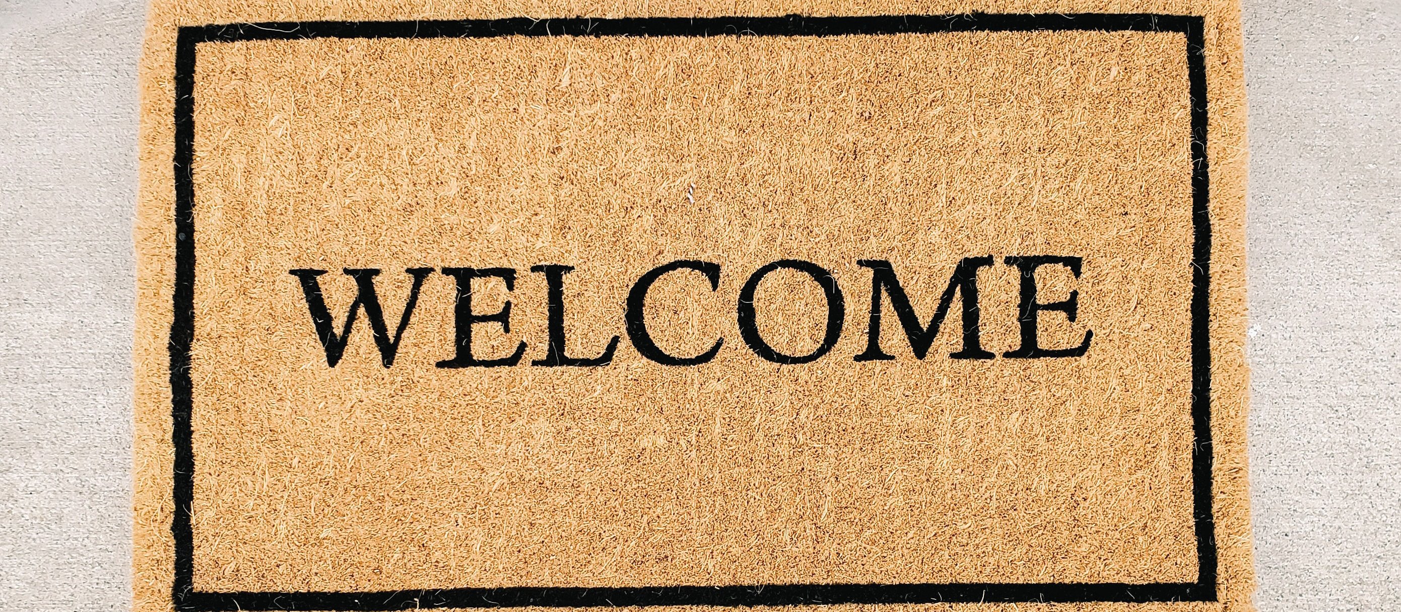 welcome mat CR Marissa Daeger on Unsplash