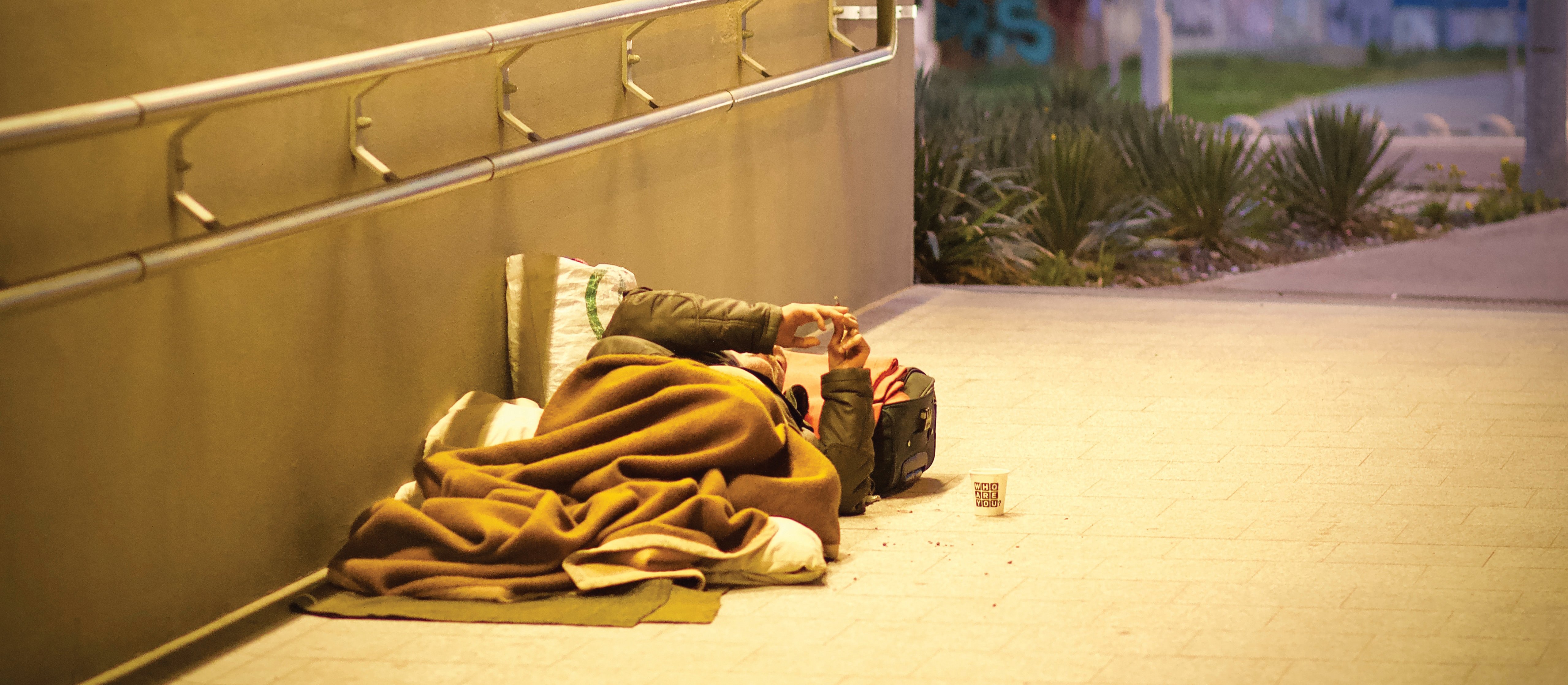 Homeless man CR Mihaly Koles on Unsplash