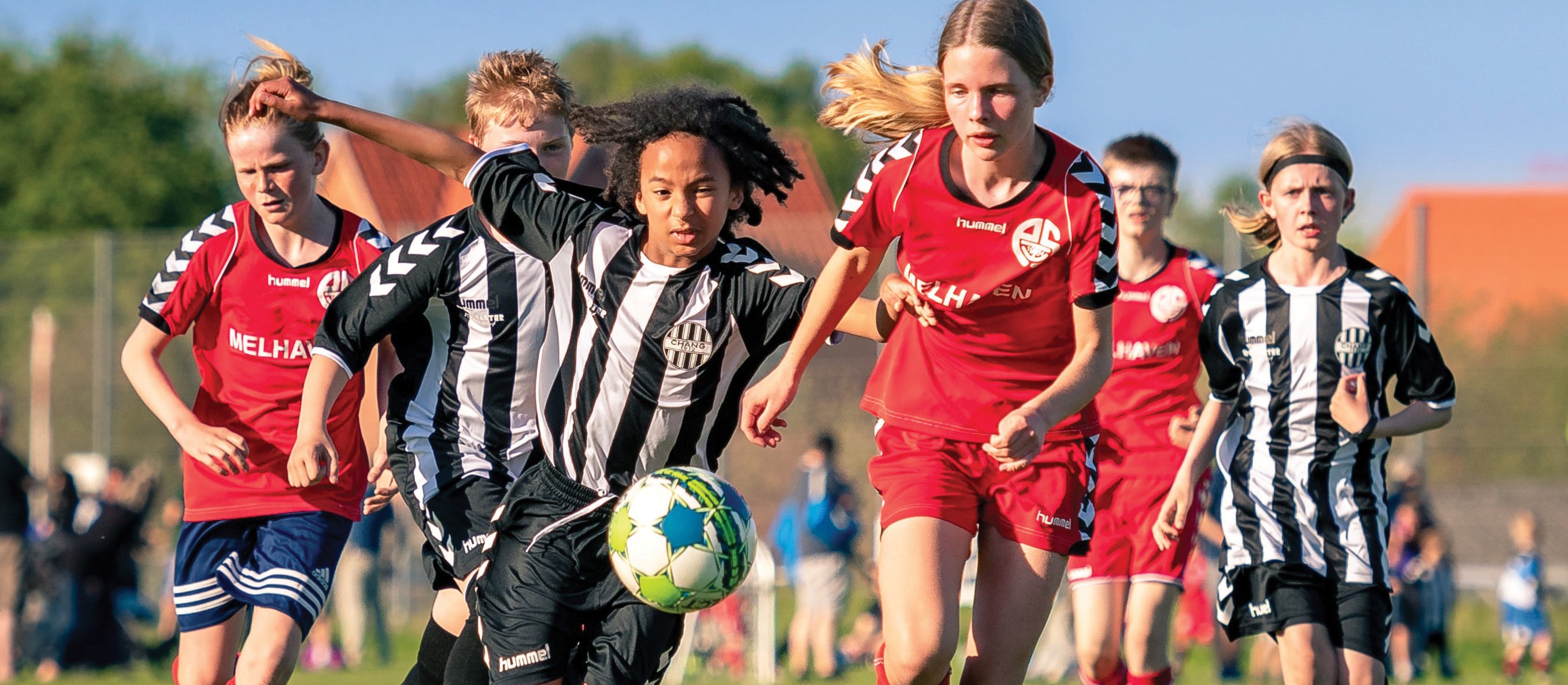 Kids playing football