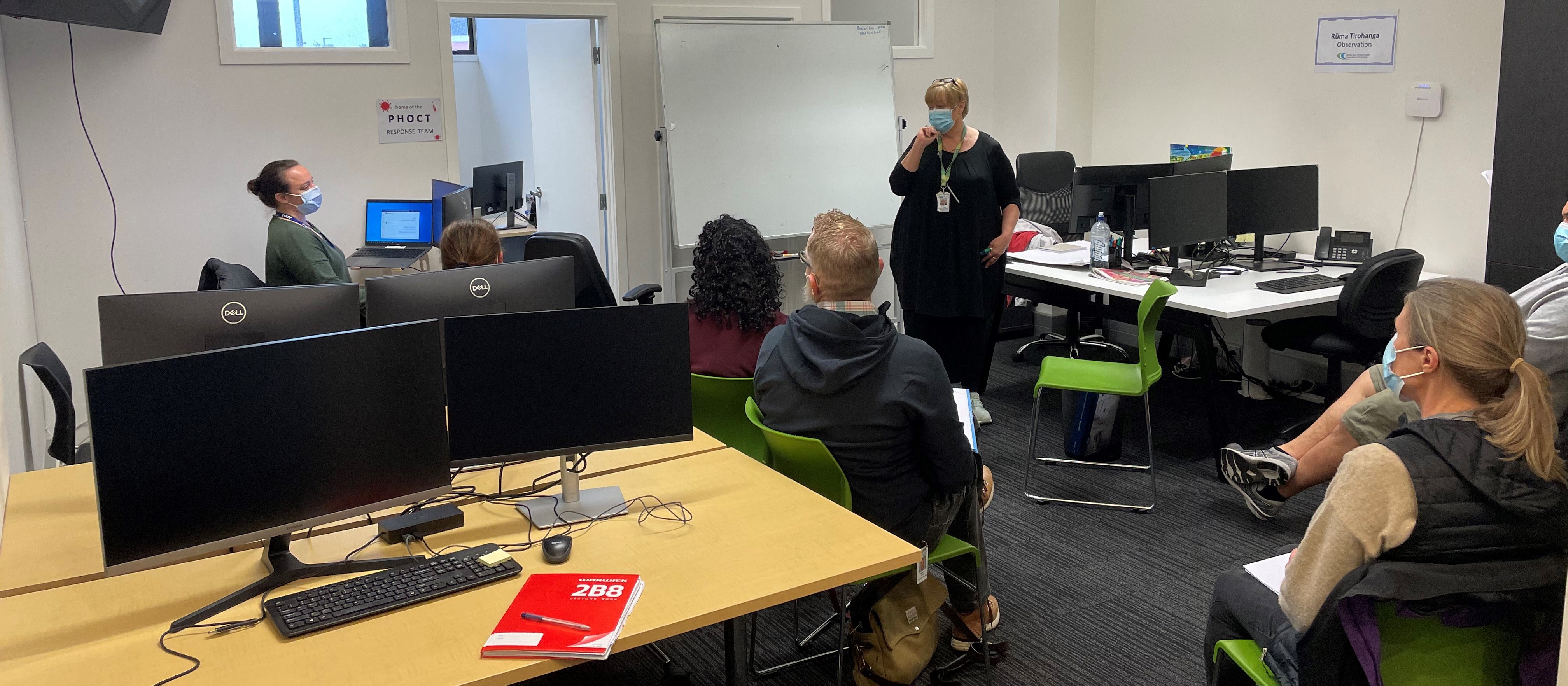 Te Whatu Ora associate director of nursing and ambulance care Joyce Forsyth with Nelson PHO health partners in the new flooding support hub 