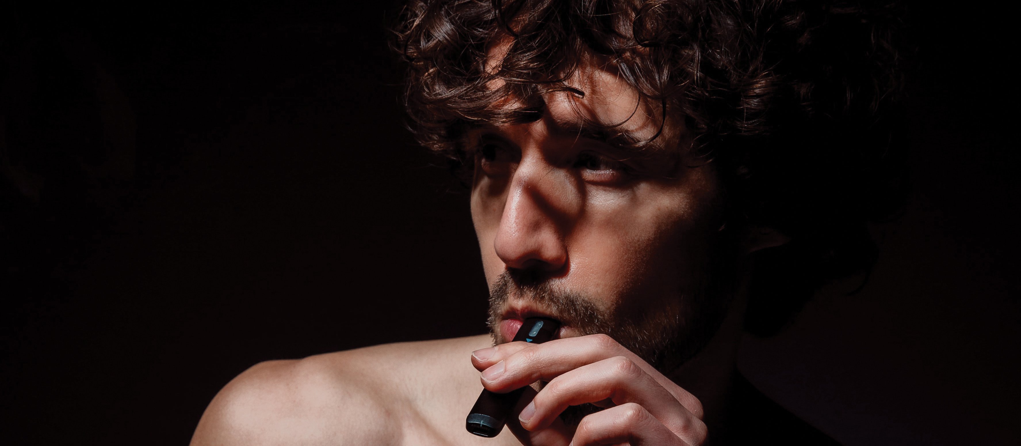 Vaping man CR Chiara Summer on Unsplash 0.jpeg