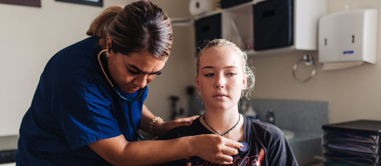 Vanisi Prescott with patient