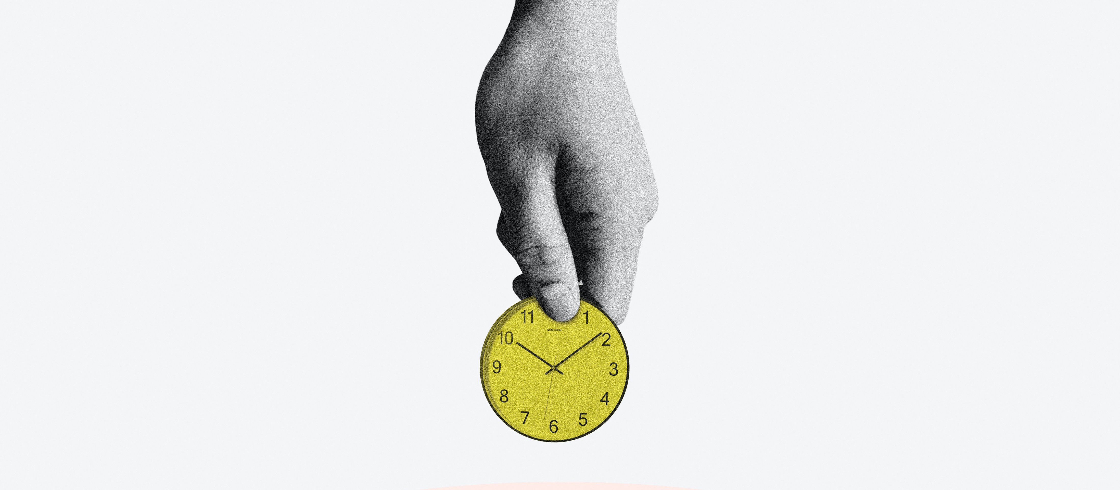 Hand holding clock