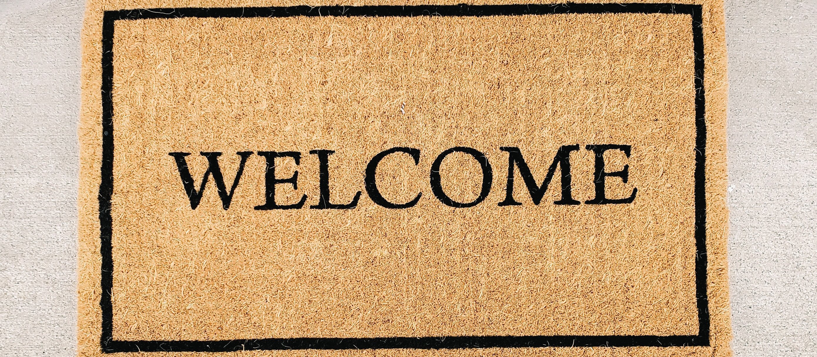 Welcome mat CR Marissa Daeger on Unsplash