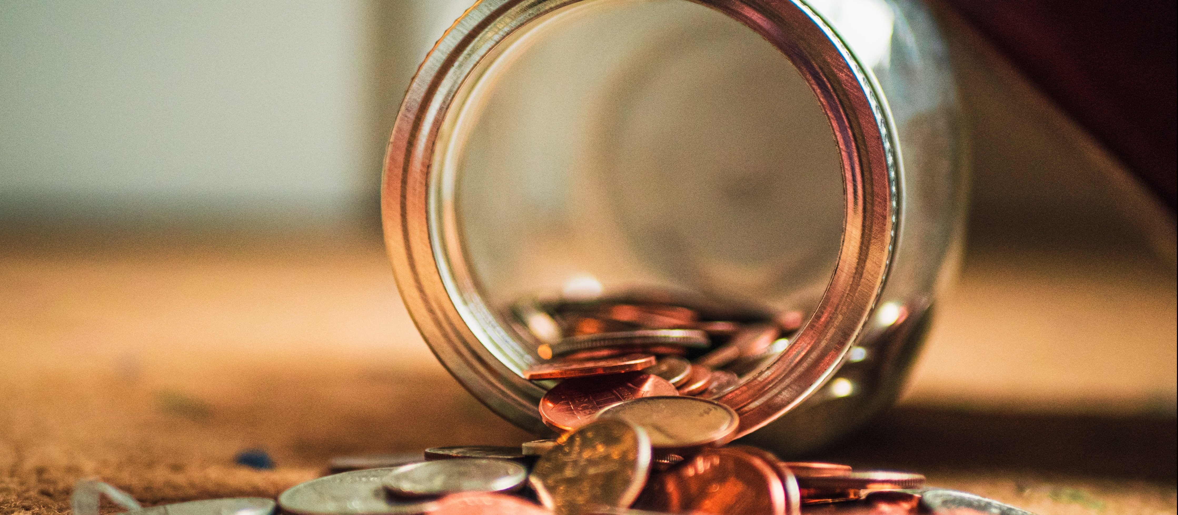 Coins and Jar CR Josh Appel on Unsplash