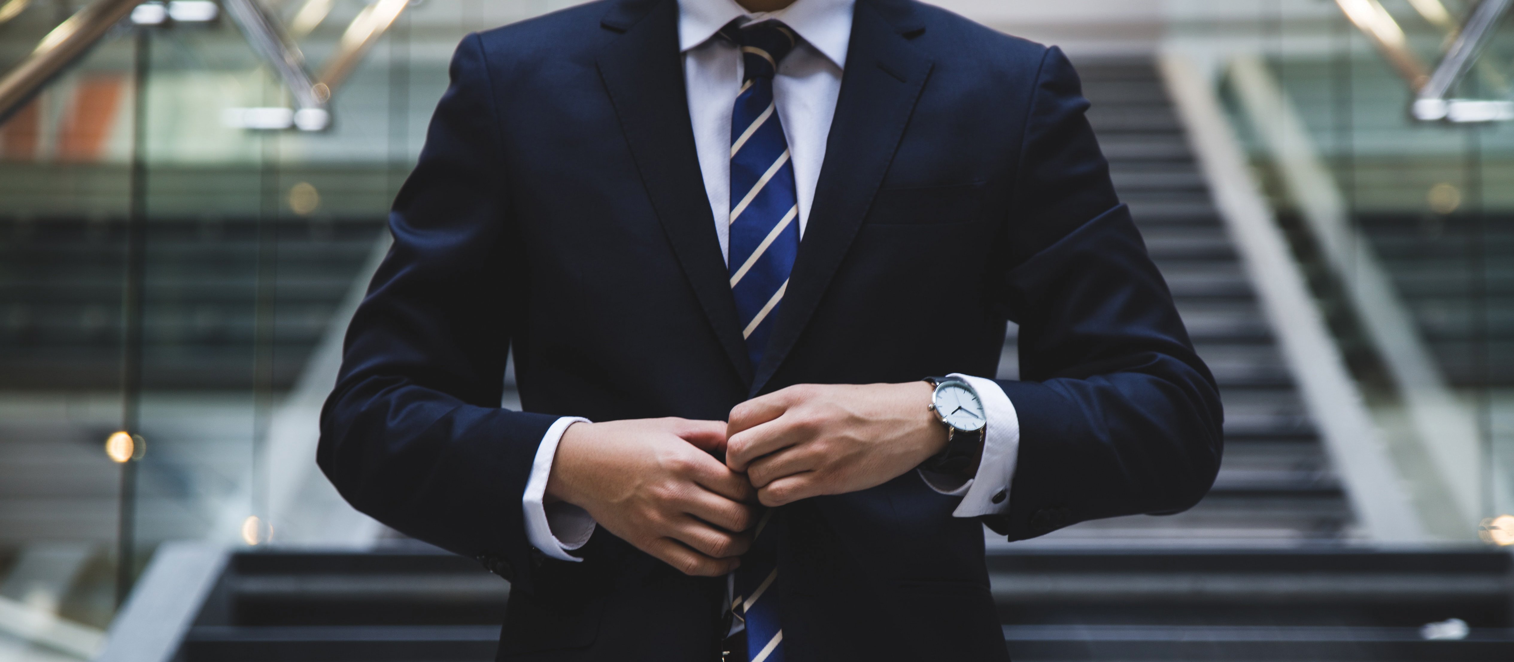 Man in suit CR Hunters Race on Unsplash