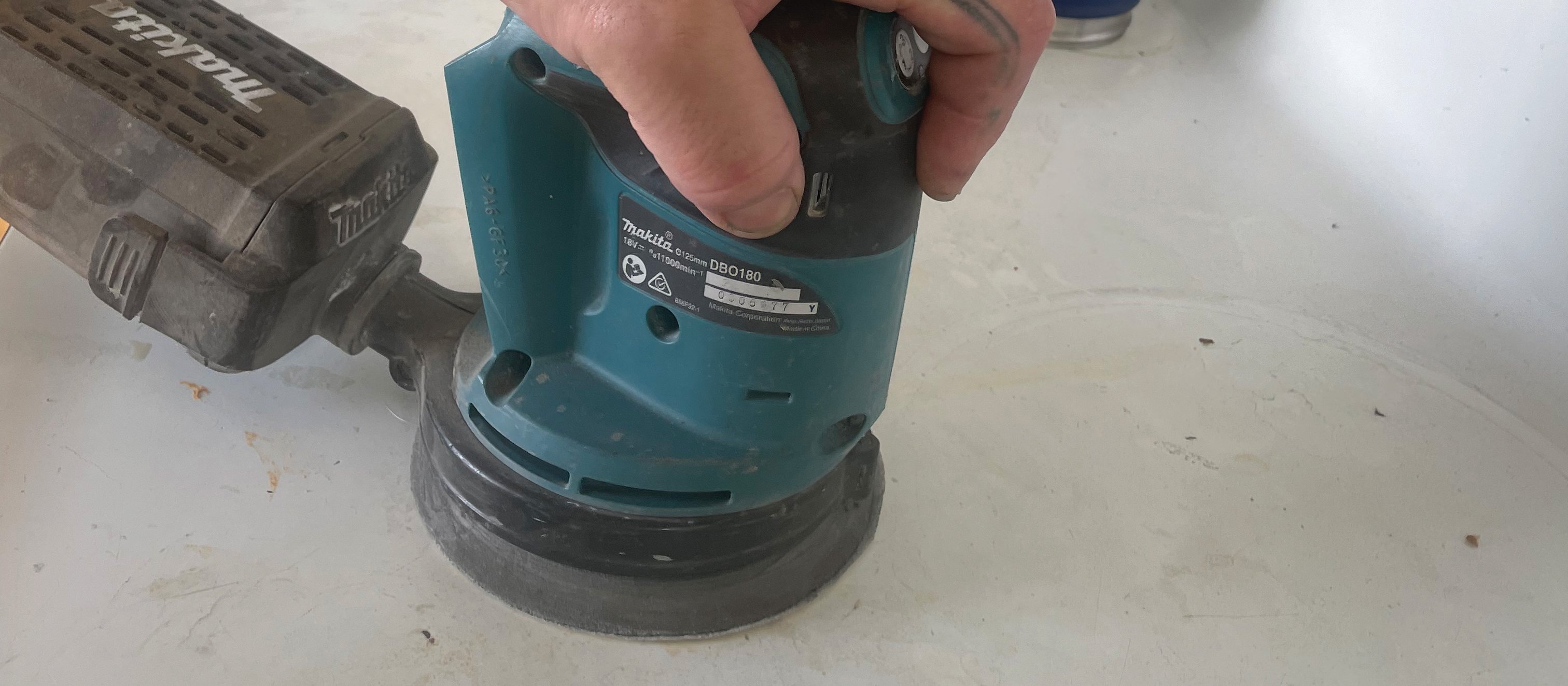The hand-held sander