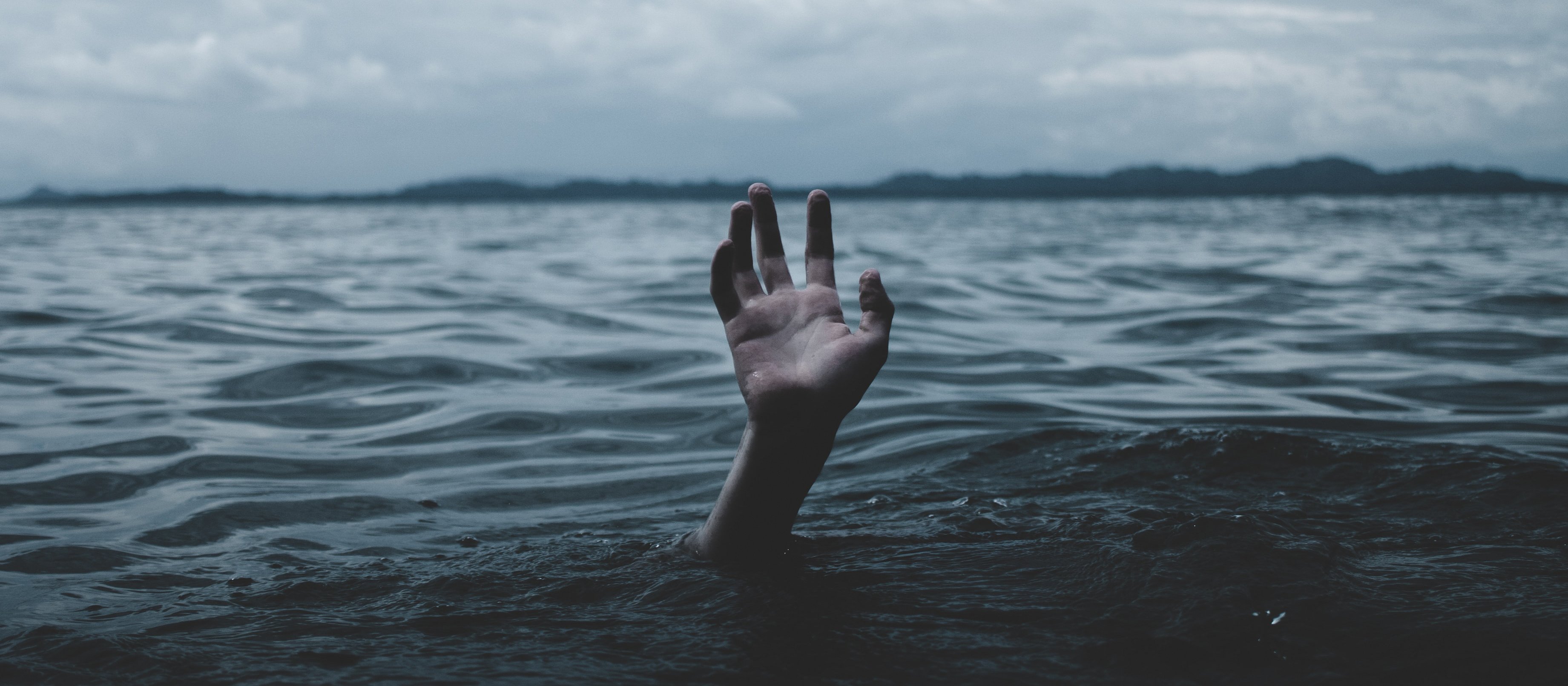 Hand up nearly drowning CR Stormseeker on Unsplash