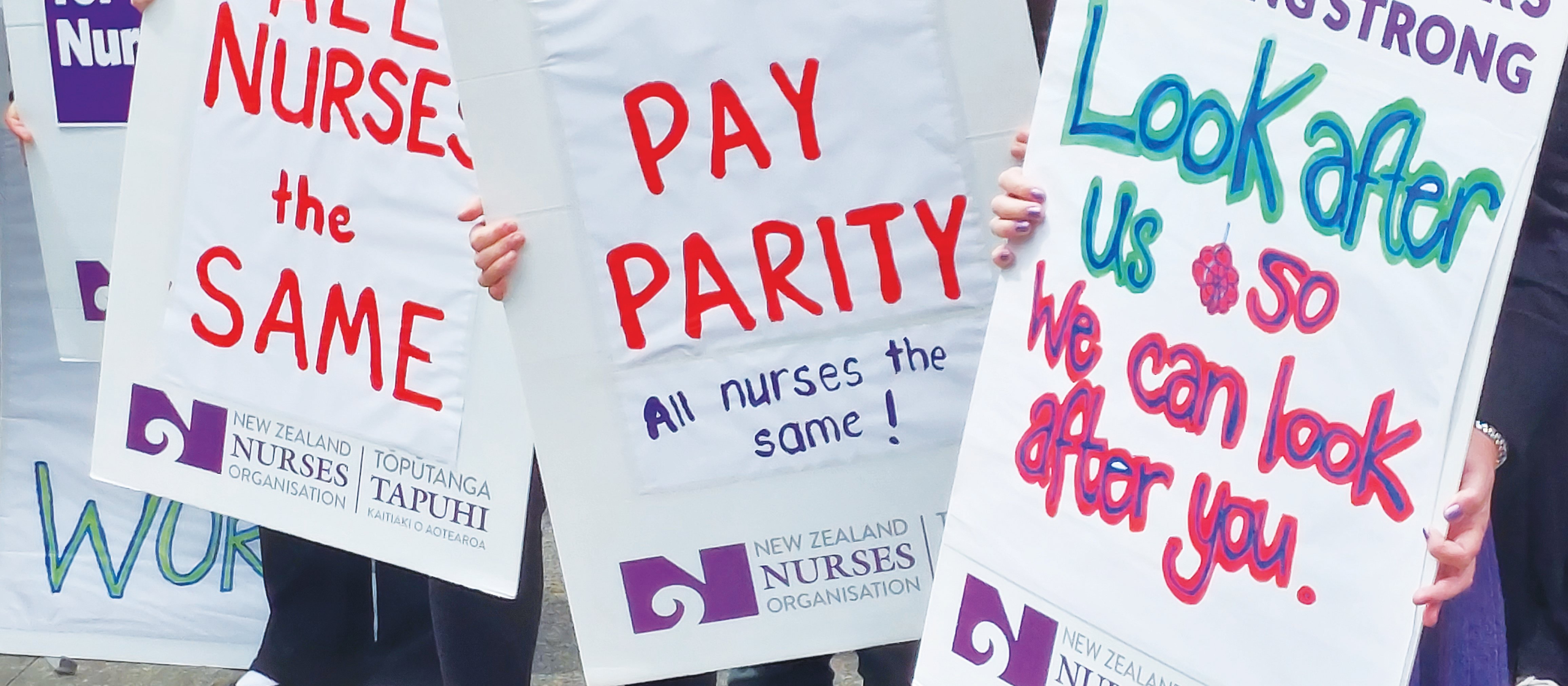Pay Parity placards Wellington Strike Rally 27 Oct 2022 CR Fiona Cassie