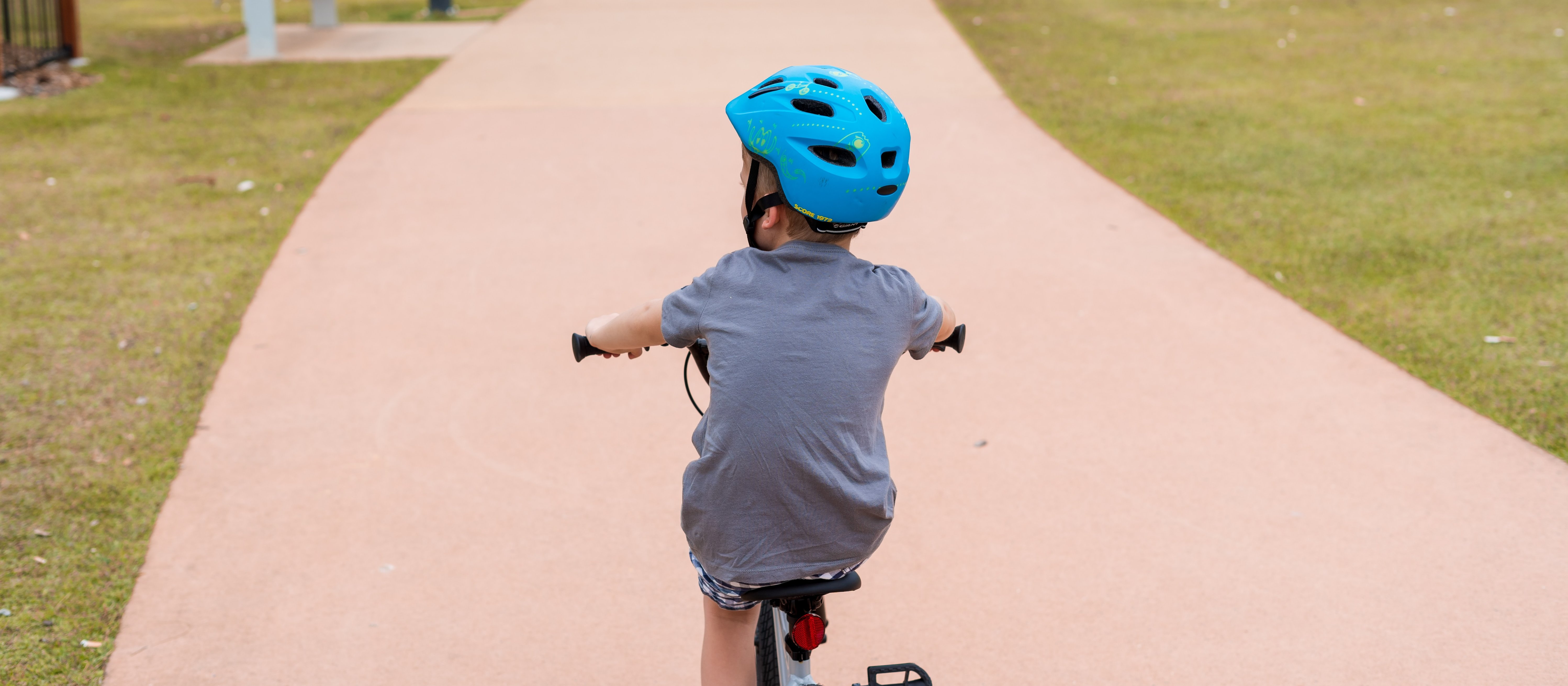 Child on bike [Image: Kelli McClintock on Unsplash]