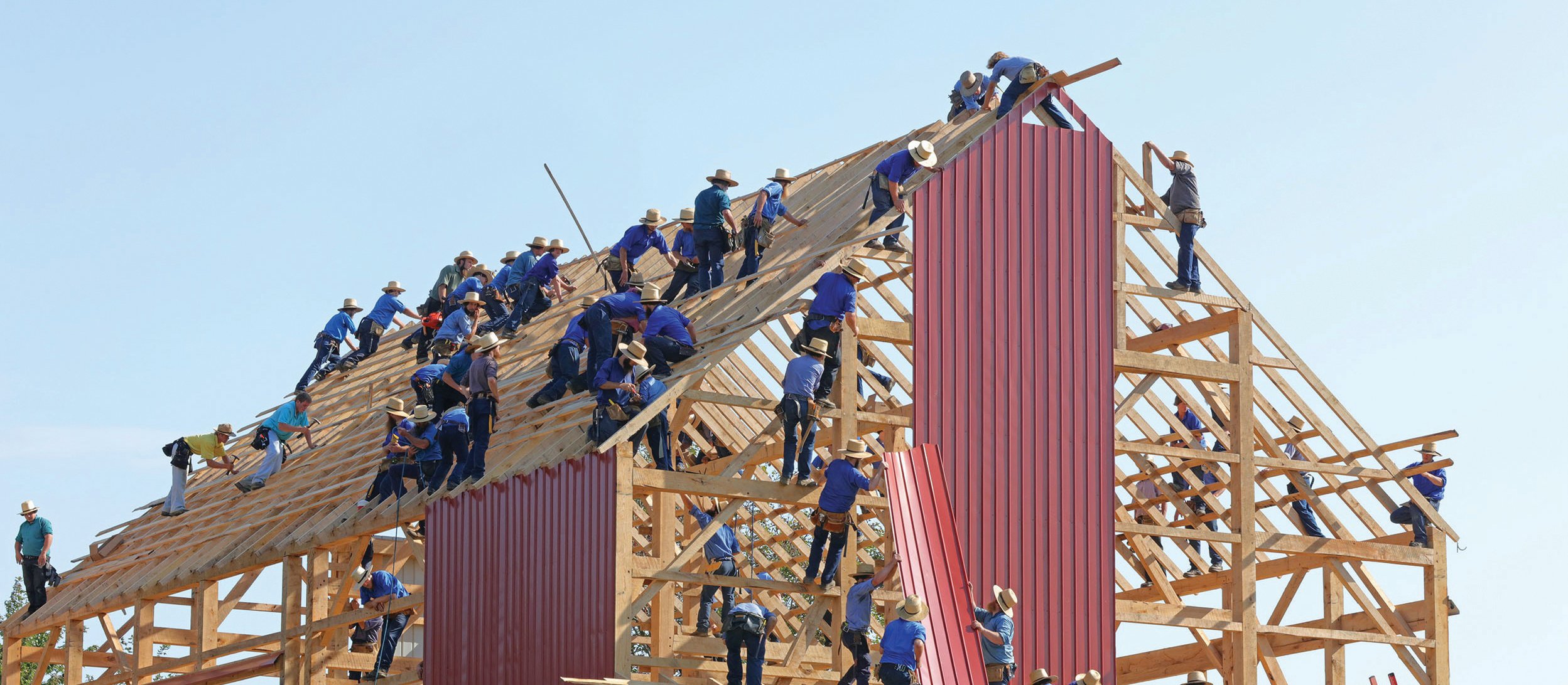 Amish building a barn CR Randy Fath on Unsplash