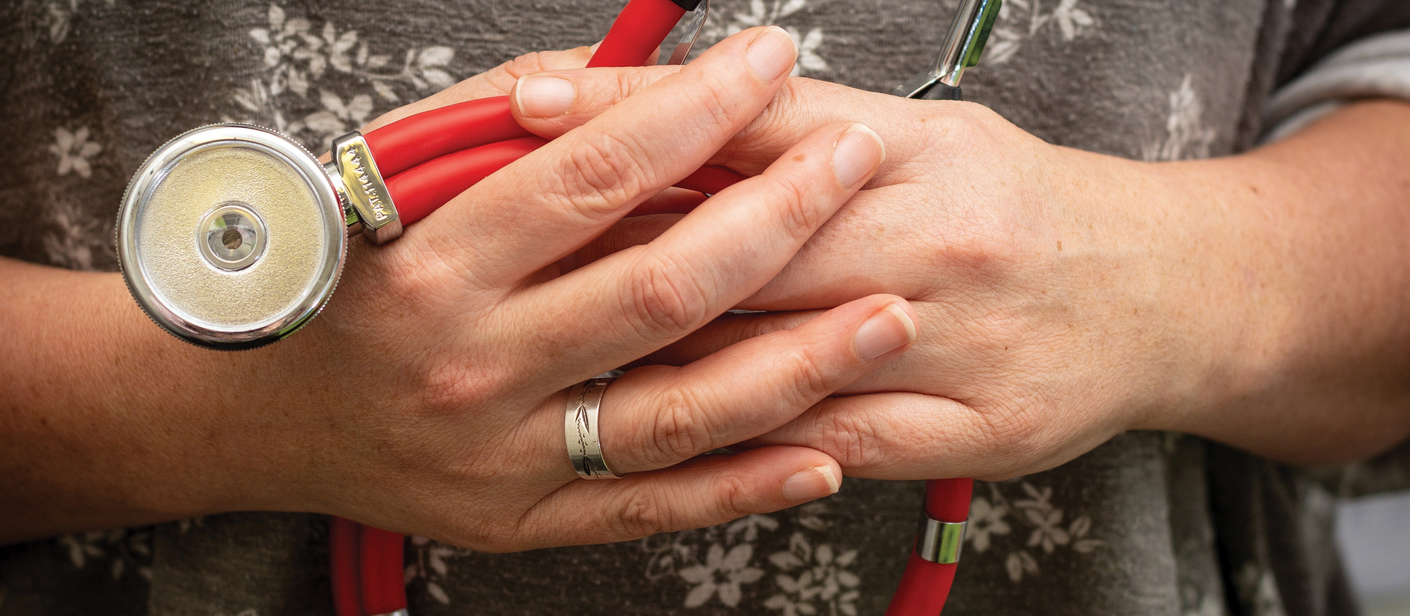 Stethoscope and hands