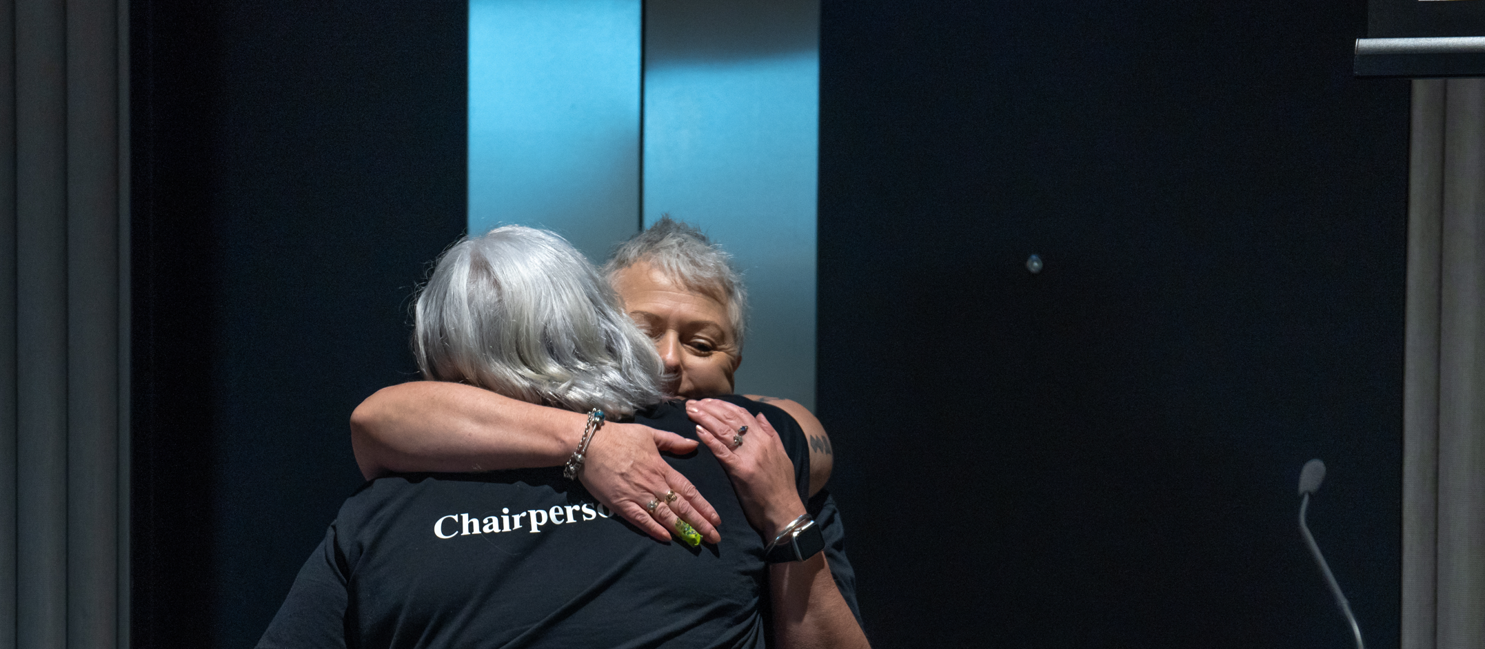Departing PMAANZ chair Michelle Te Kira being hugged by incoming chair Mary Morrissey_KeepaDigital