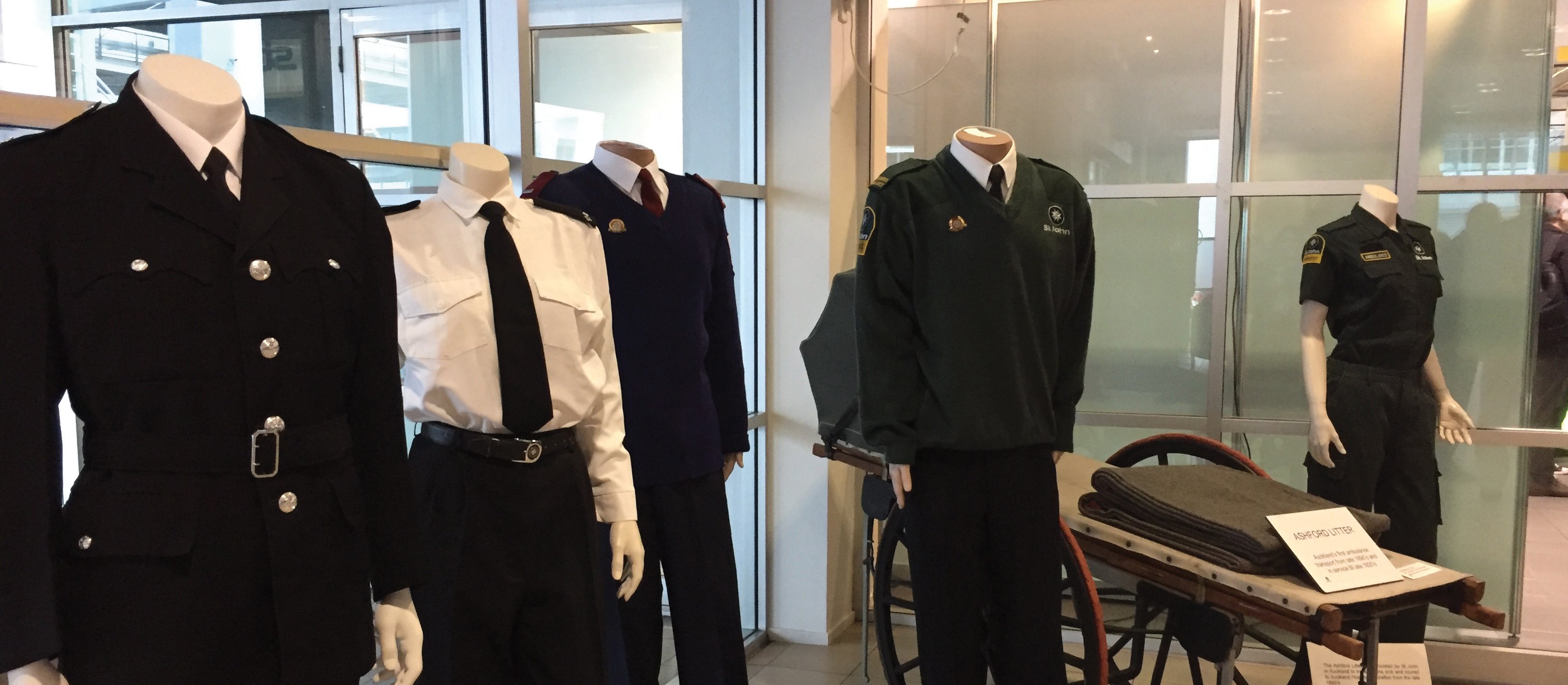 Past and present ambulance officers uniforms