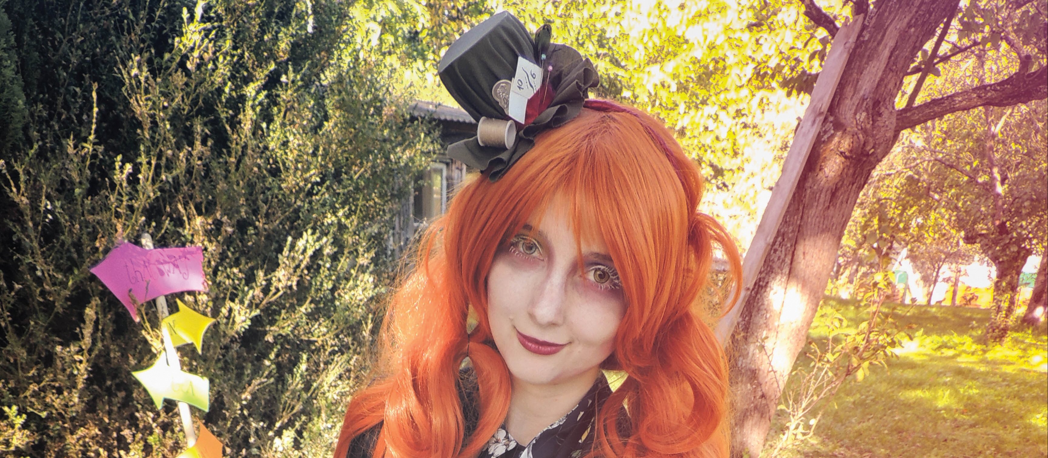 Alice in Wonderland CR Evelyn Cosplay on Unsplash