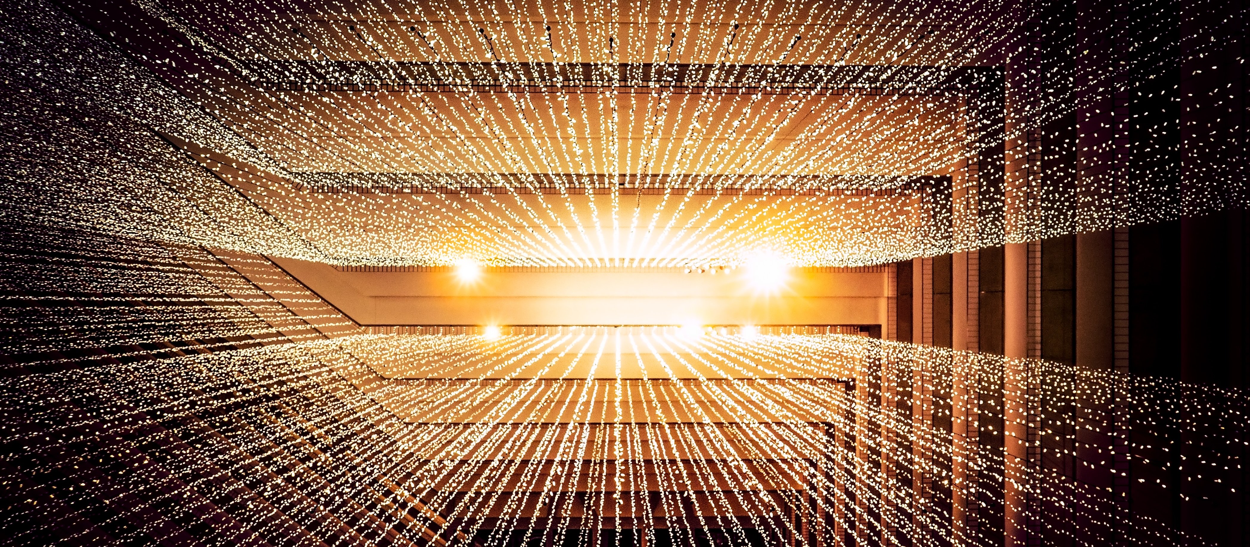 Image shows bright orange/yellow light in lines from the centre of the image out to the viewer