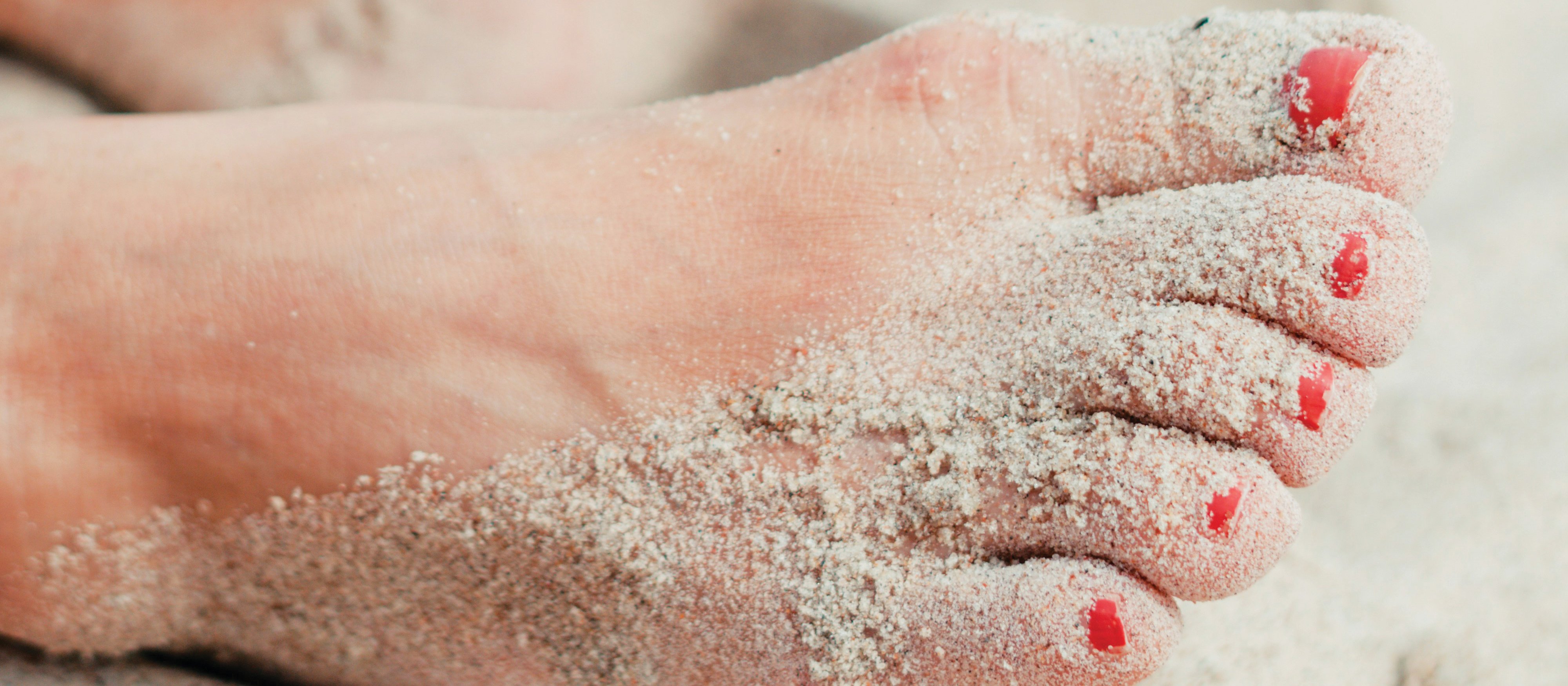 Sandy woman's feet