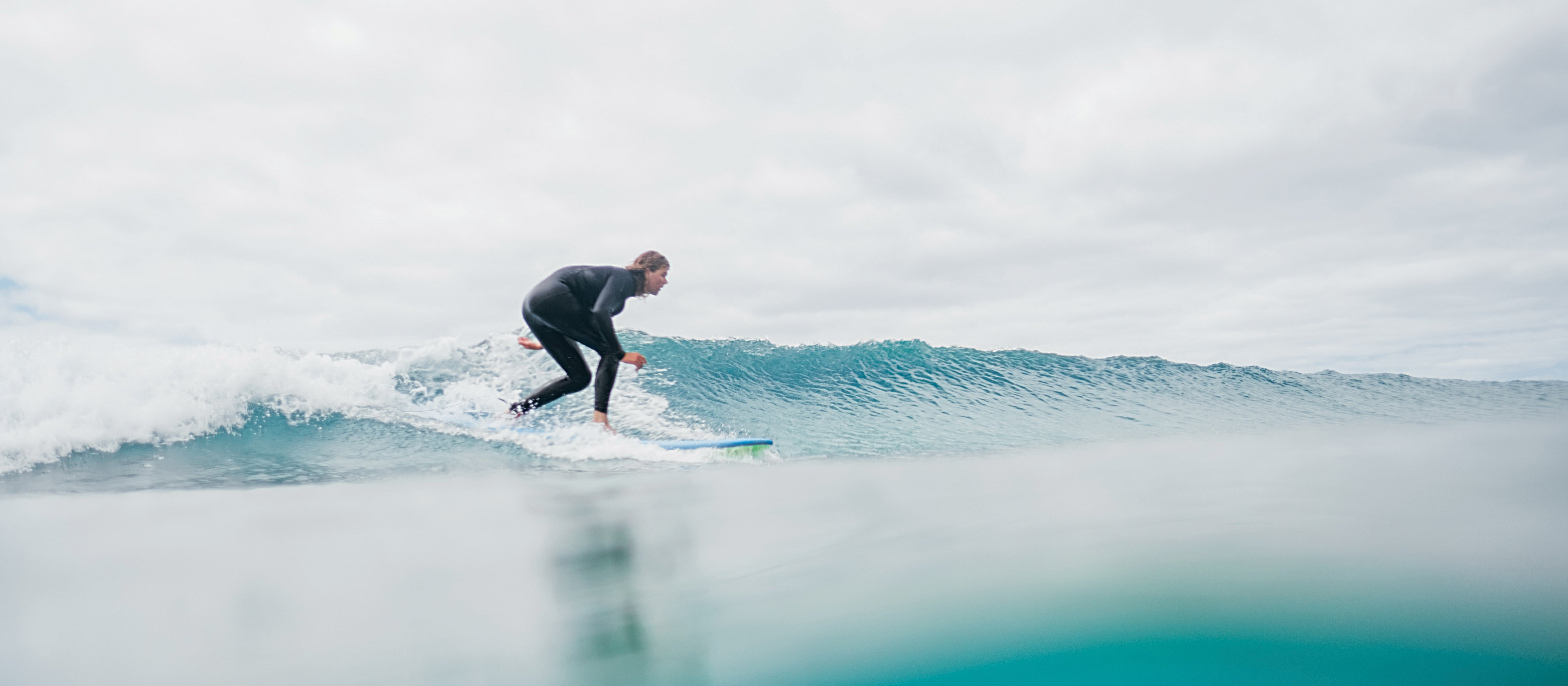 Surfer Wave CR Zac Harris on Unsplash