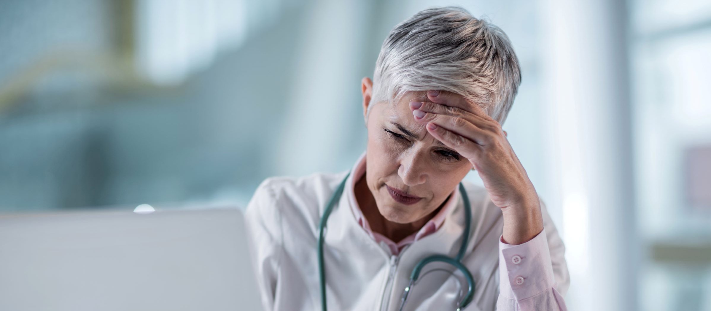 Doctor, stressed, computer, patient portal [CR BraunS on iStock]