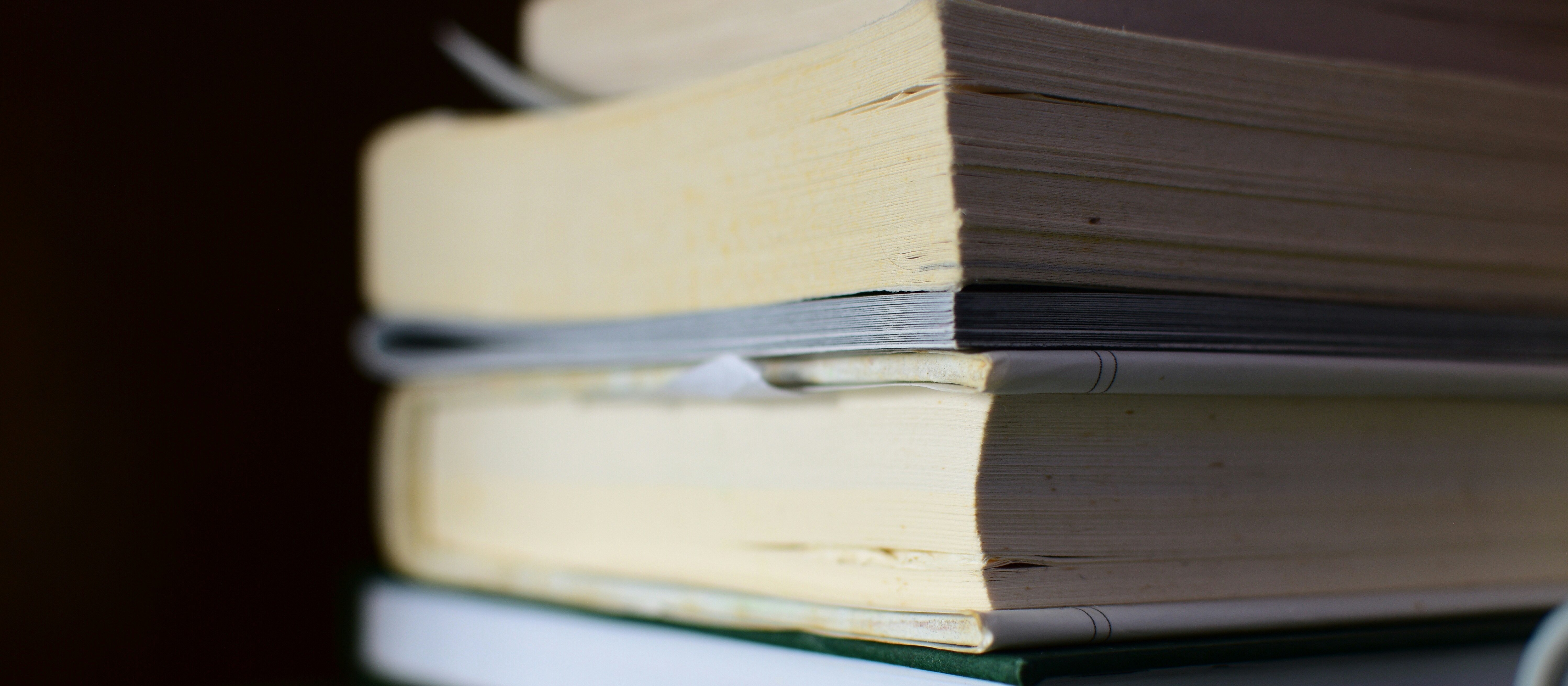 Stack of books, black background