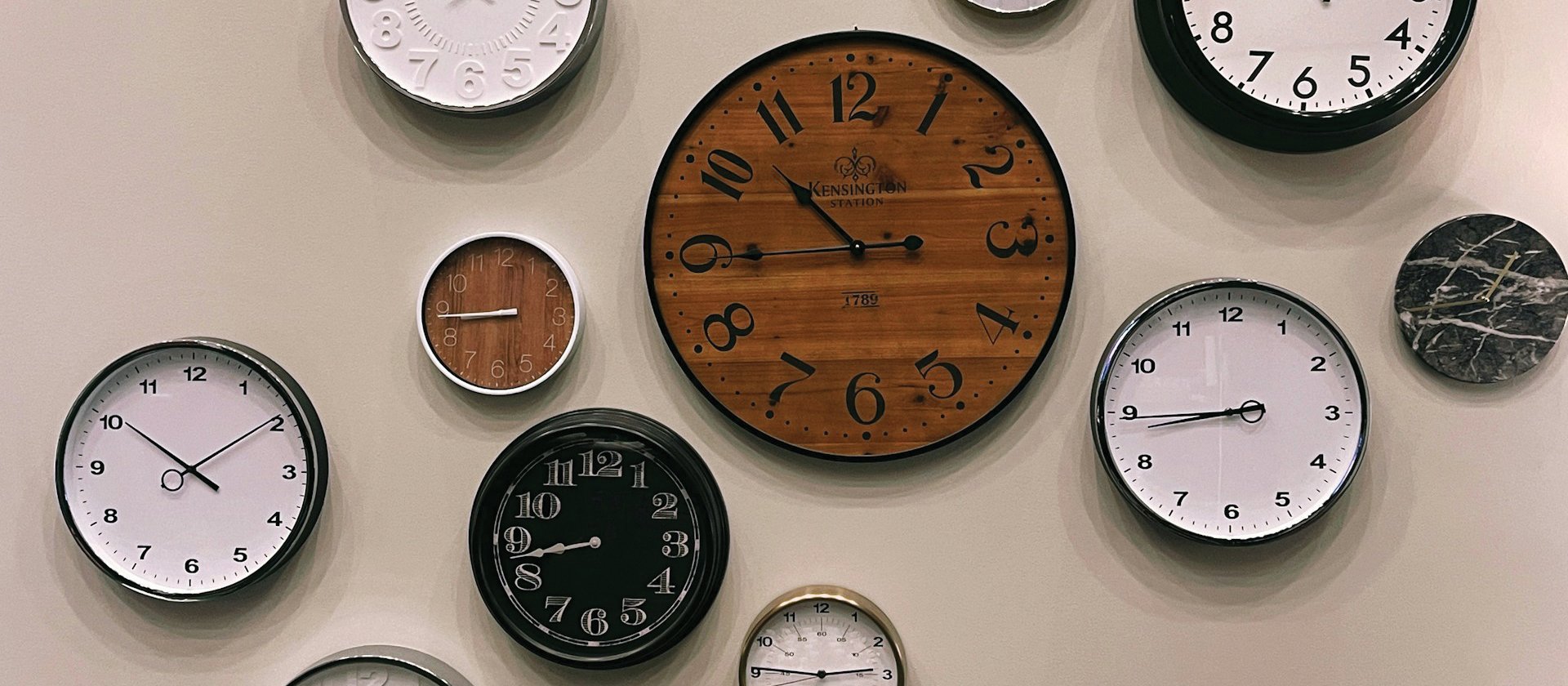 Clocks on wall CR Jon Tyson on Unsplash