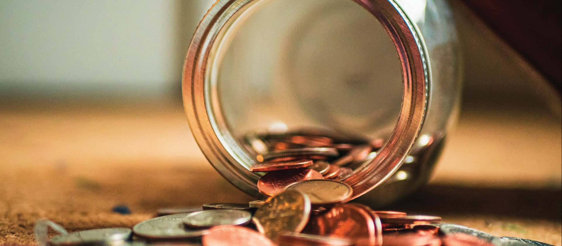 Coins and jar CR Josh Appel on Unsplash