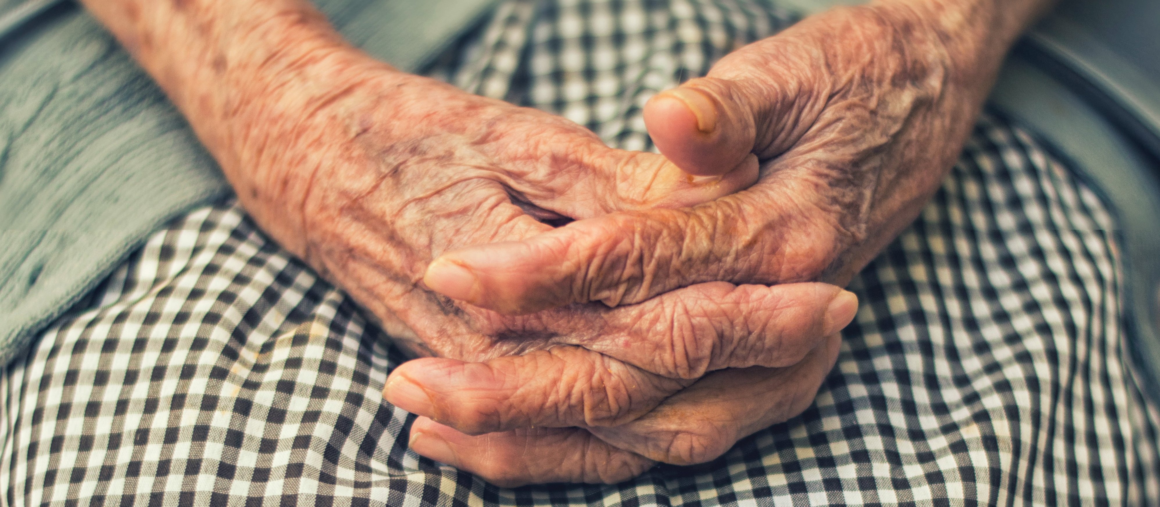 Elderly hands CR Cristian Newman on Unsplash