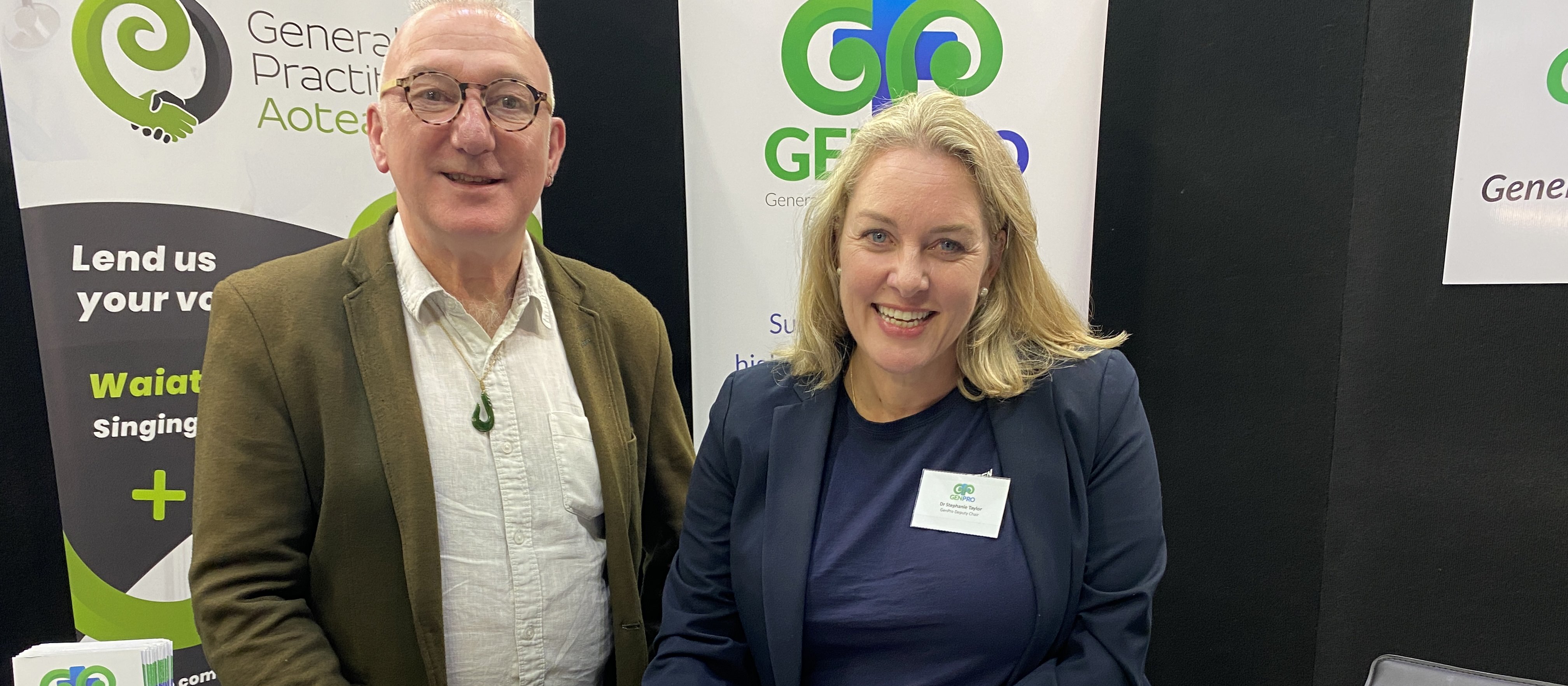 Buzz Burrell and Stephanie Taylor signing MOU