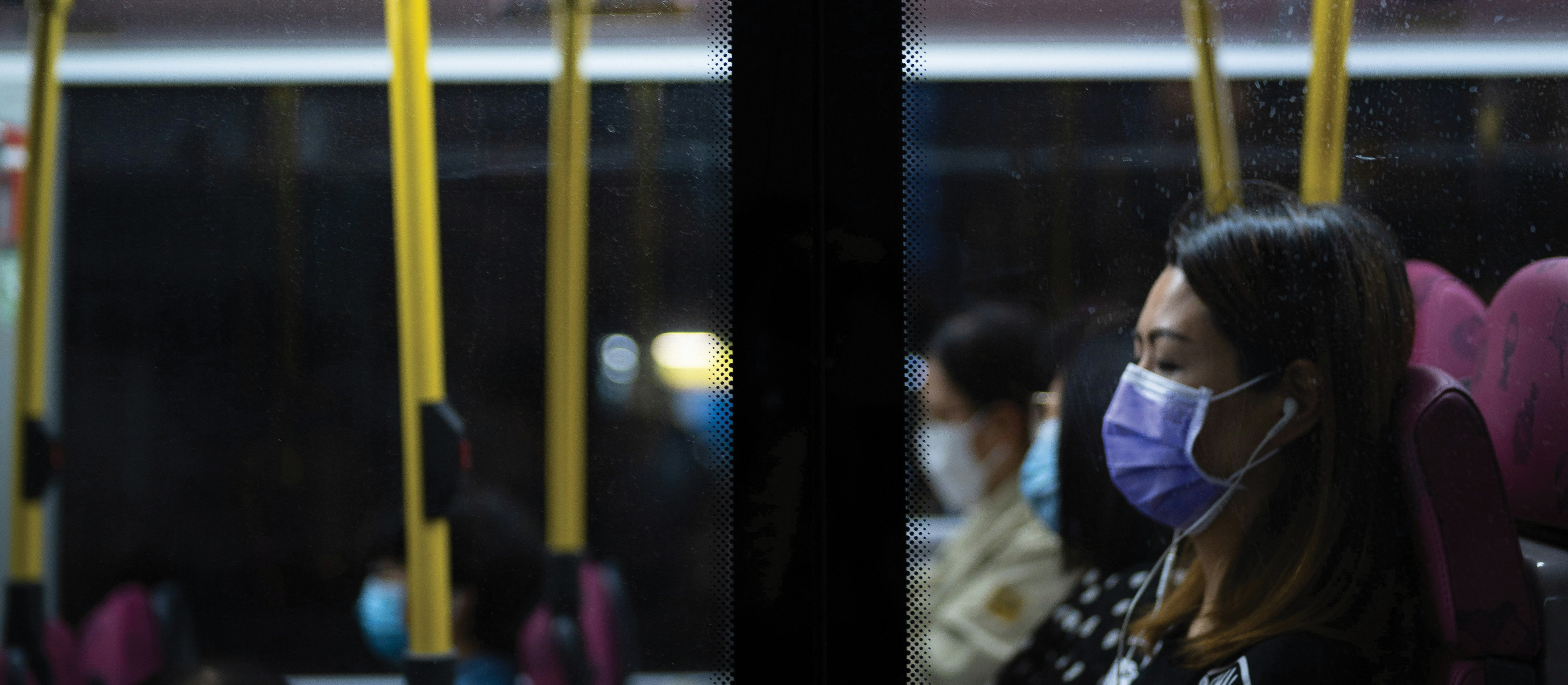 masks on bus CR red john on Unsplash